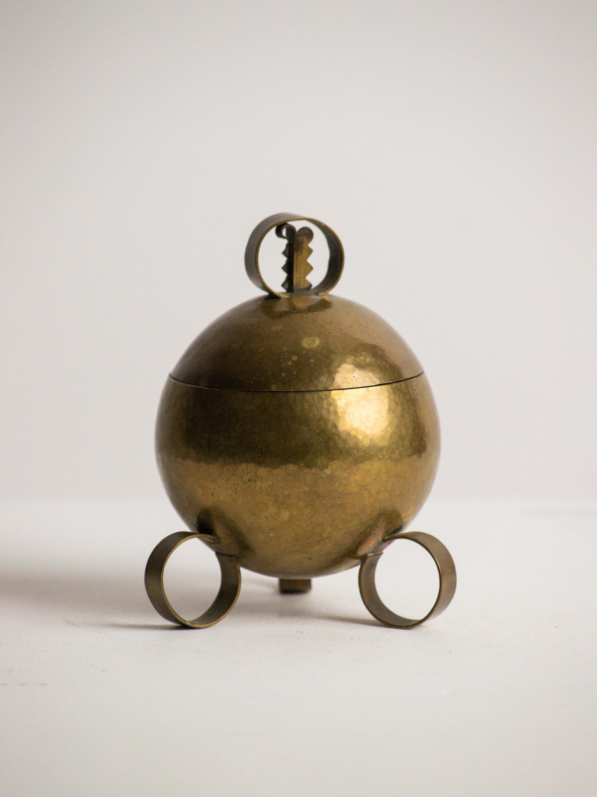 Hand Raised Brass Sphere Box with Toothed Zigzag Finial, Art Deco Style, Central European Workshop, circa 1930s by Studio Ecubed