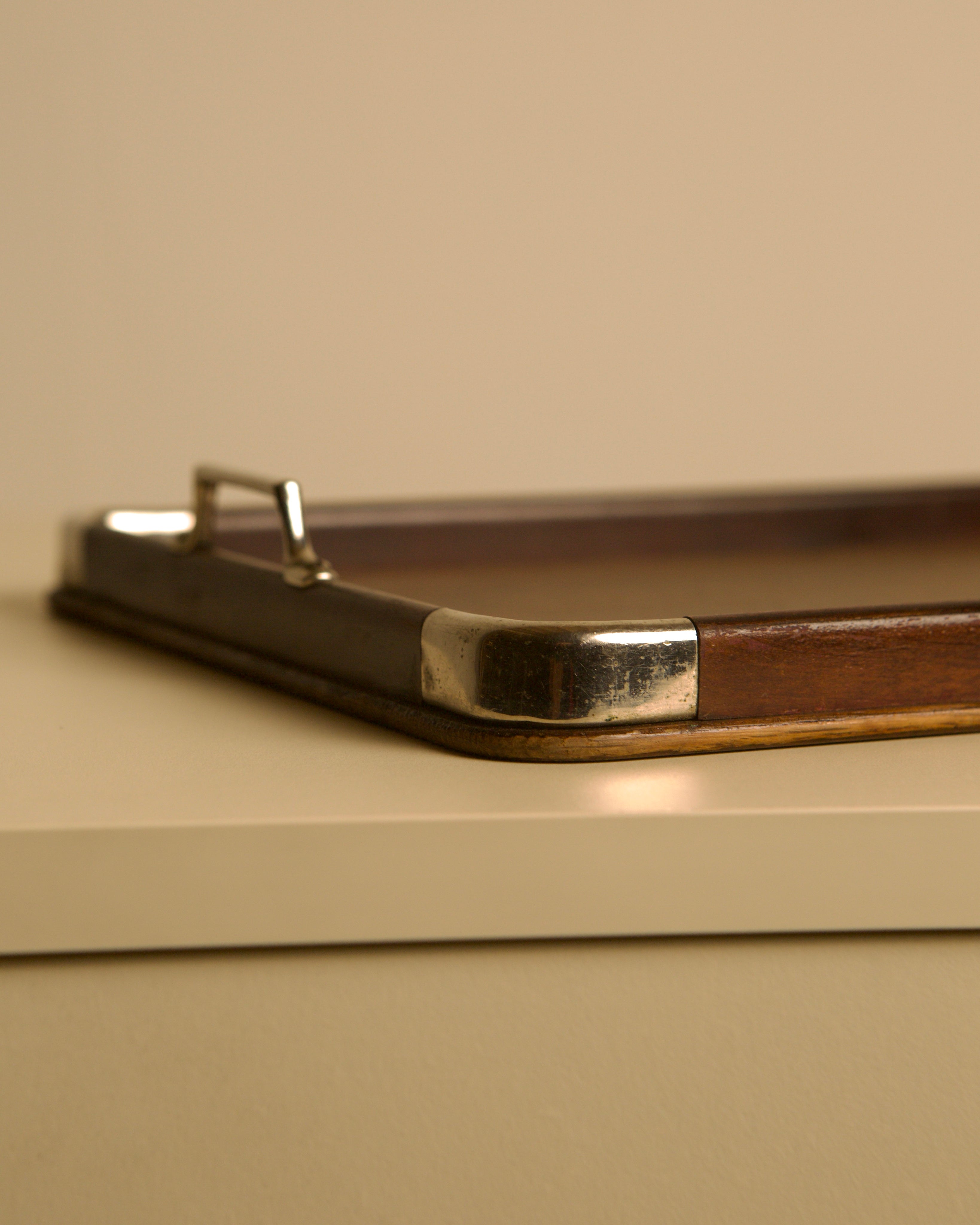 Large Italian tray in wood and metal, 1950s — angled view highlighting metal corners