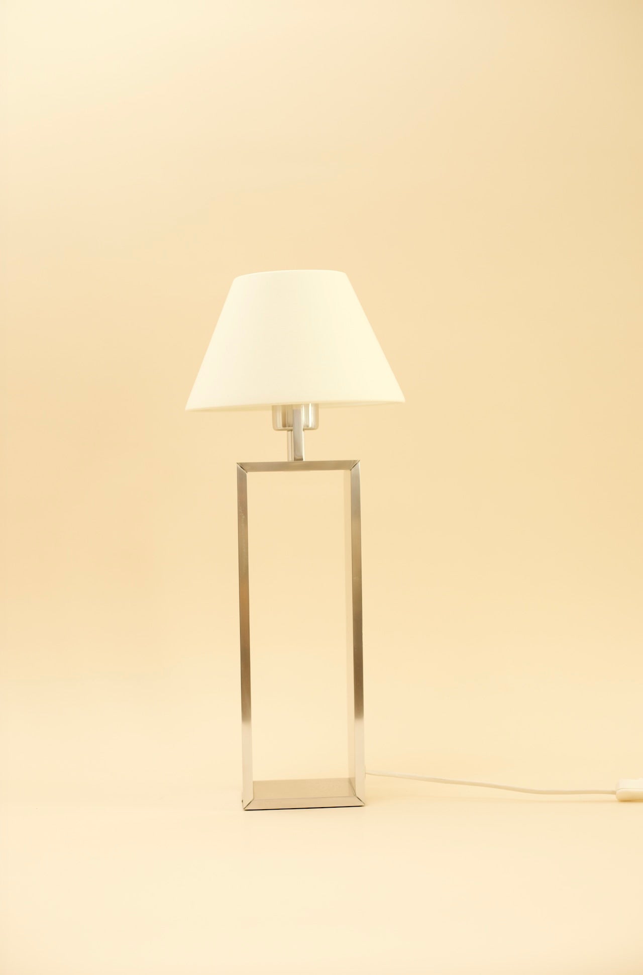 BREUER Table Lamp — close-up of modern metallic base and white shade