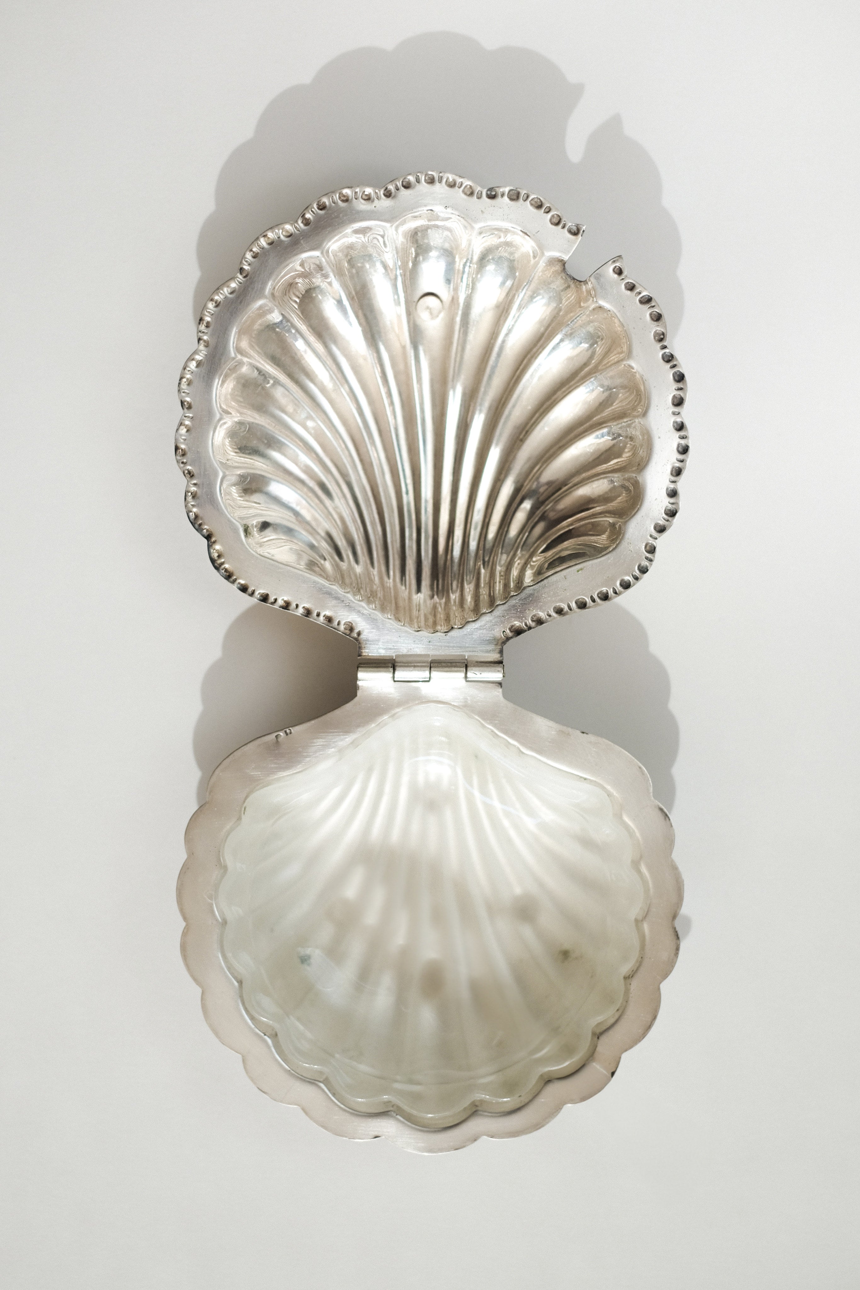 Shell Shaped Butter Dish — top view of polished silver surface