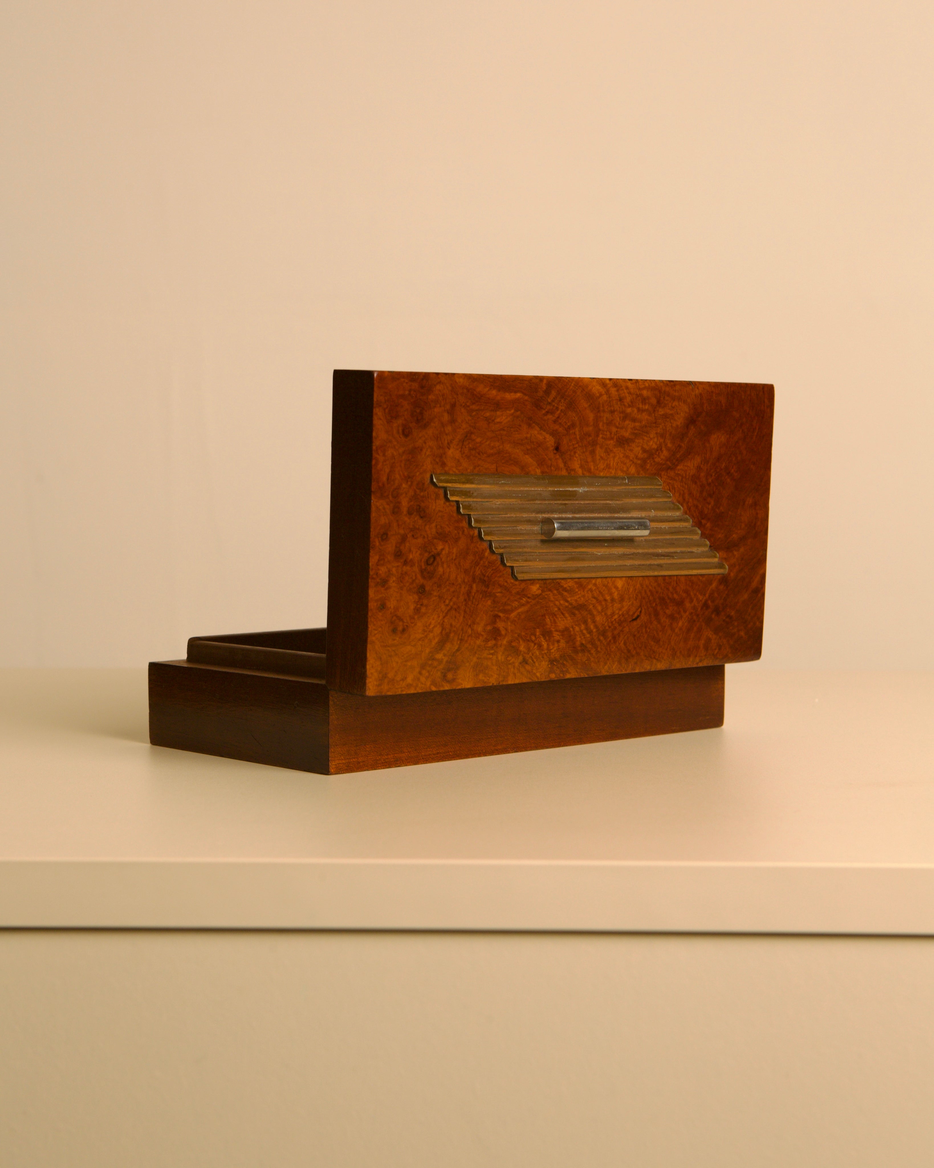 Italian Art Deco Box in wood and silver, 1930s — angled view on white surface