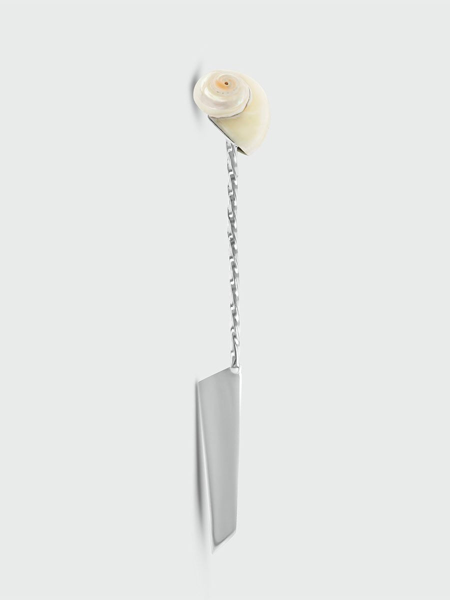 Shell Knife — side view highlighting polished metal blade and shell handle