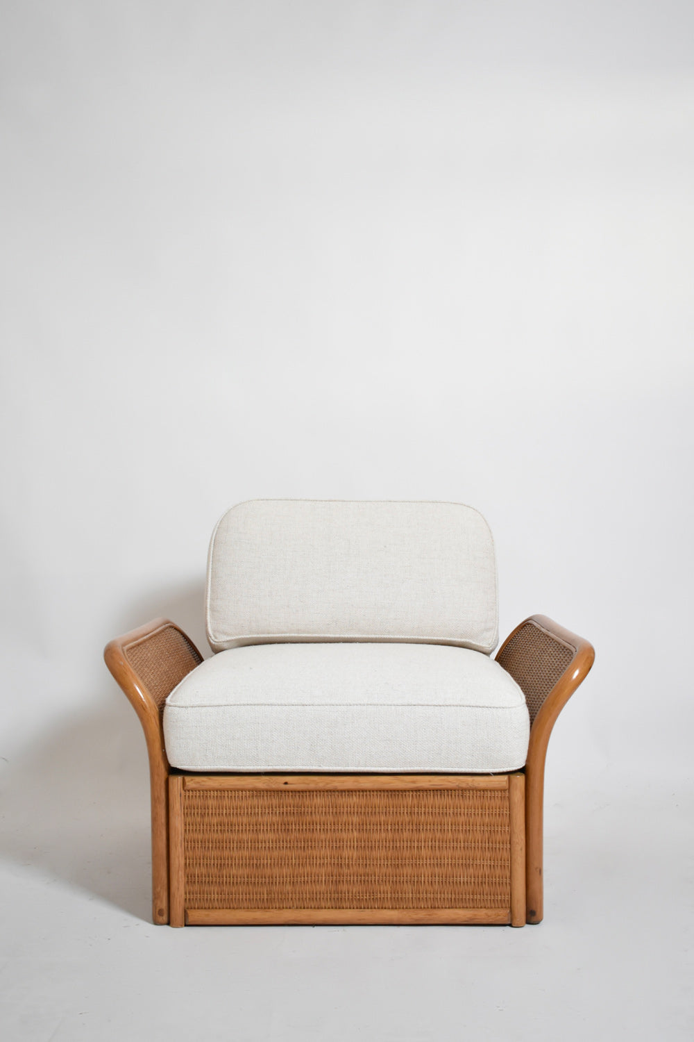 Pair of wicker armchairs, 1970s — side angle