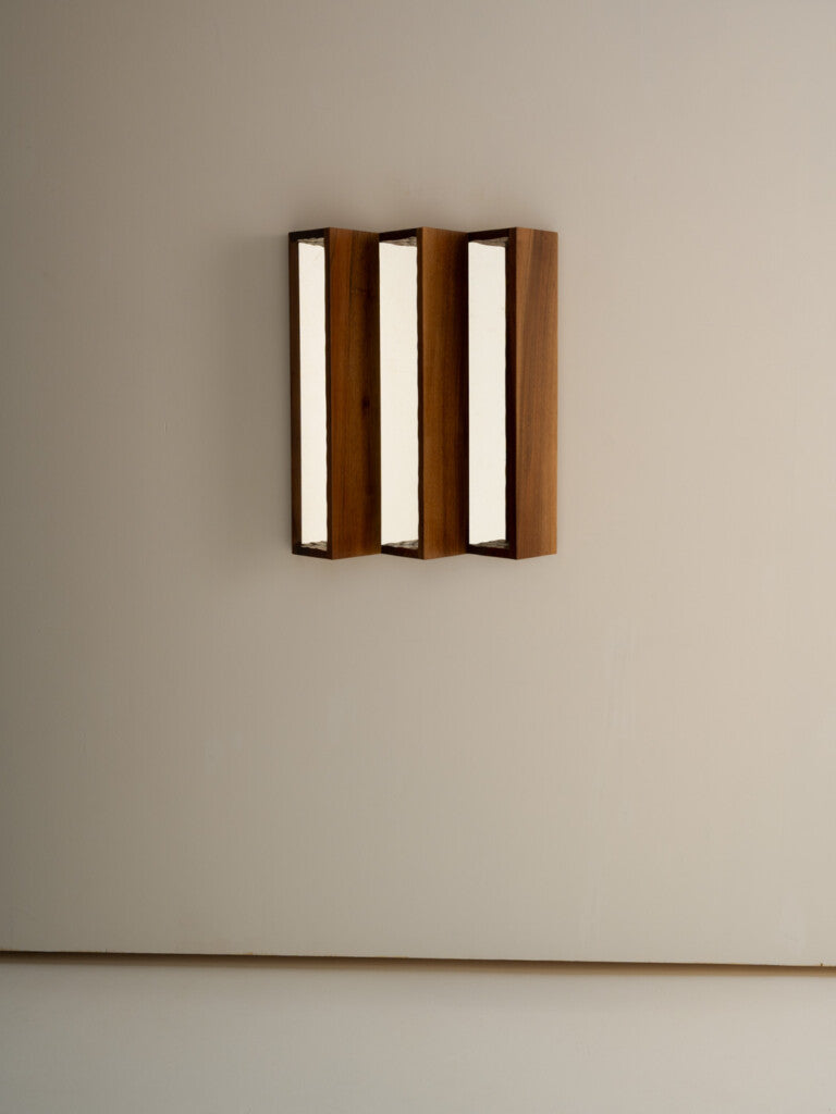 Small Perception Mirror — side angle showing three wooden panels