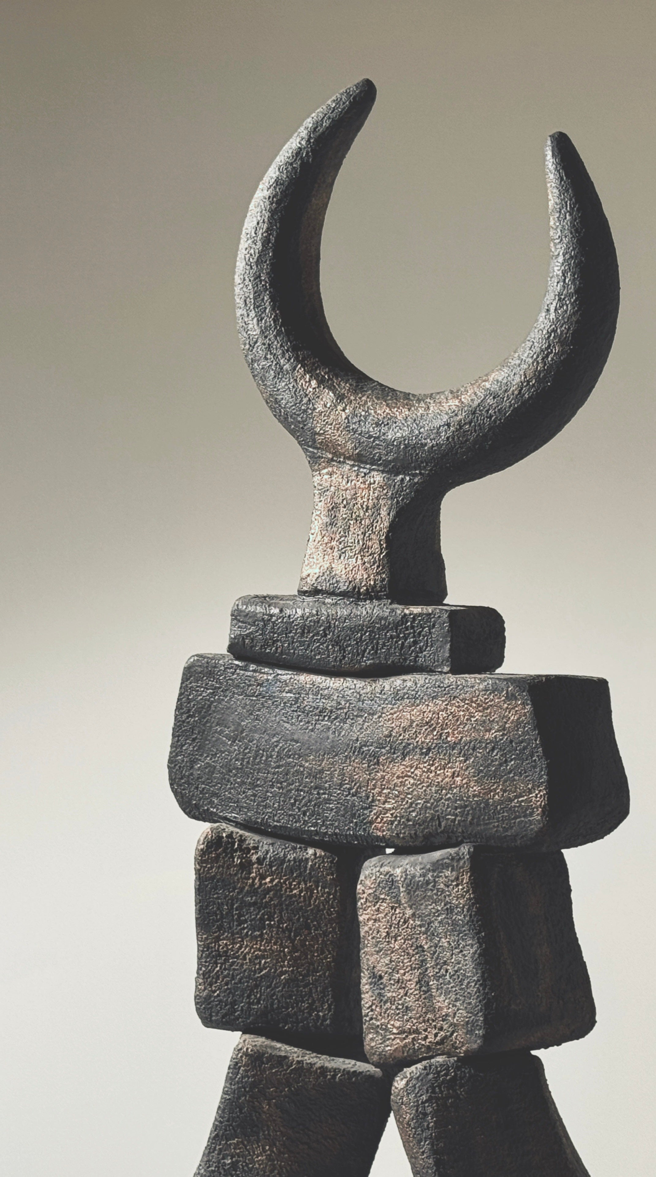 Stone sculpture totem with crescent moon top by Dominique Pouchain