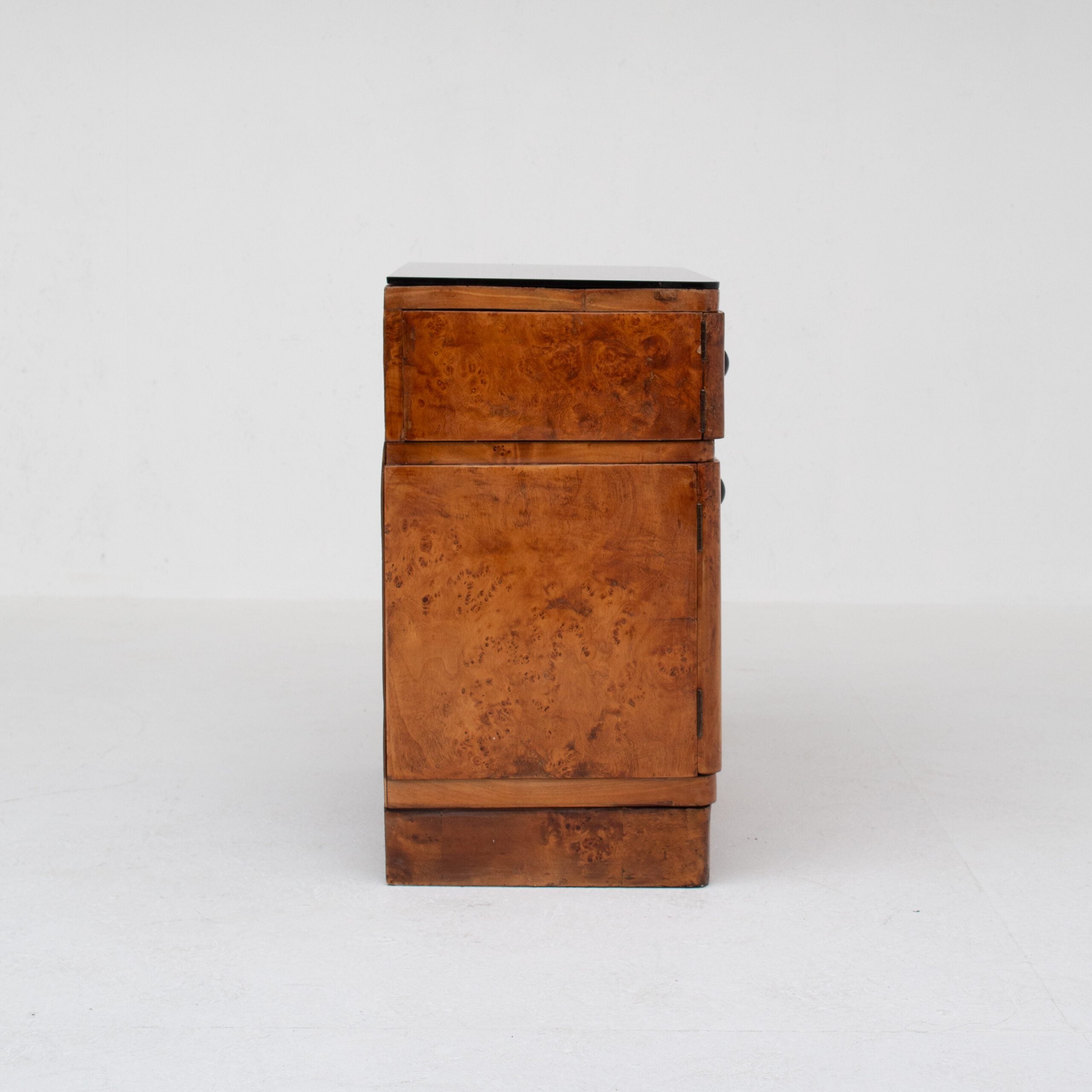 Pair of Art Deco Nightstands in Burlwood — side view highlighting rich wood texture