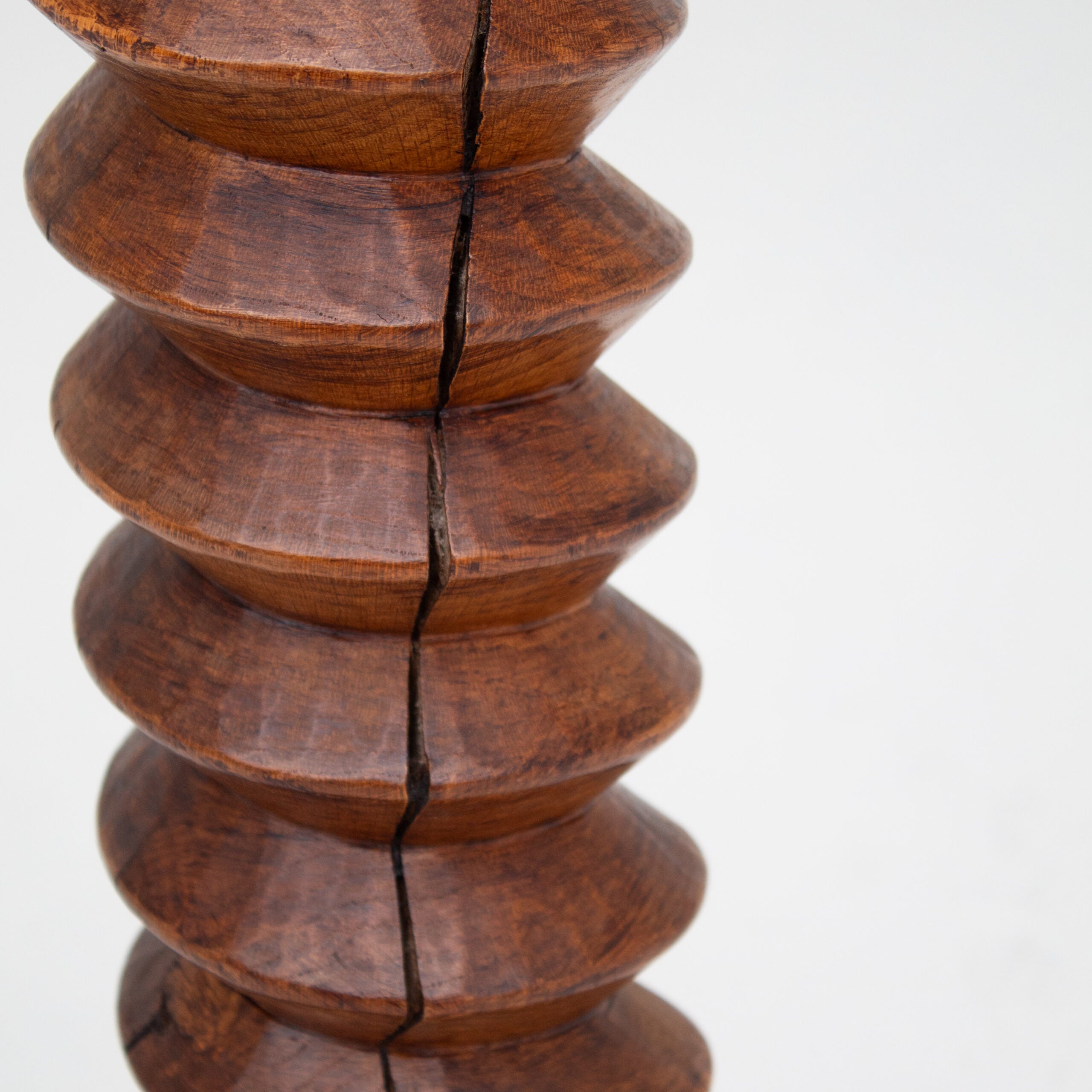 Hand-Carved Wooden Pedestal in Solid Walnut — lifestyle setting
