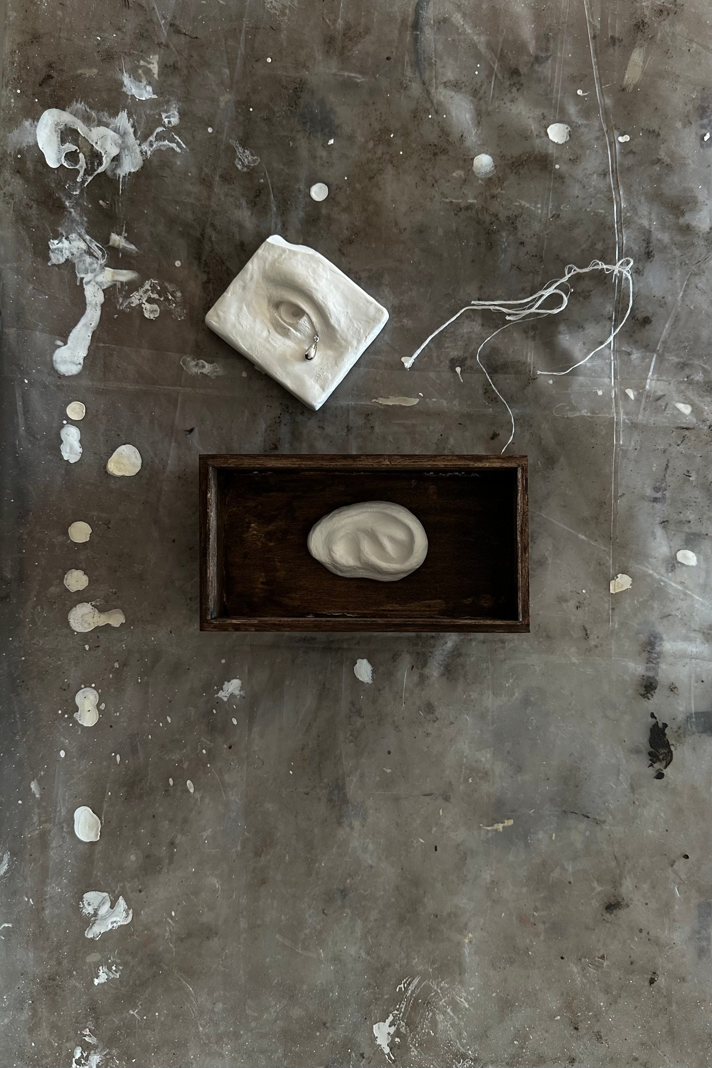 'UNSENT EAR' candleholder — in context
