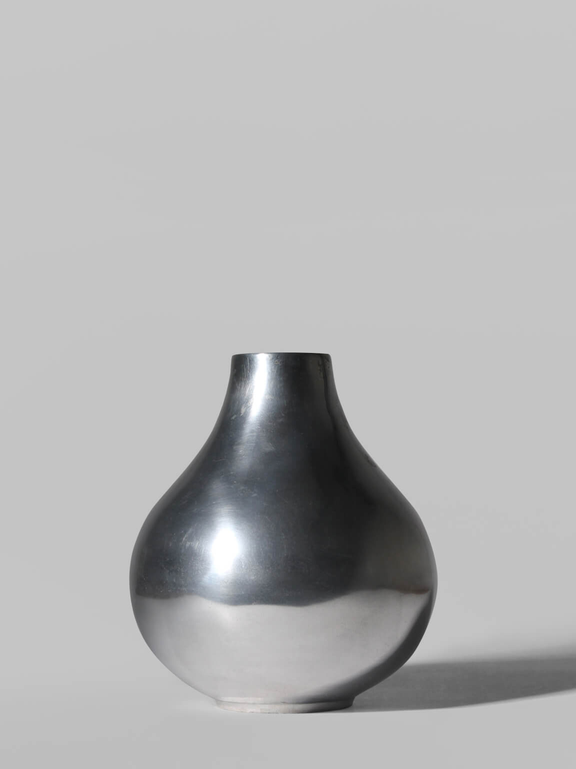 Polished Aluminum Bulbous Vase by Vintage Stories | The Oblist