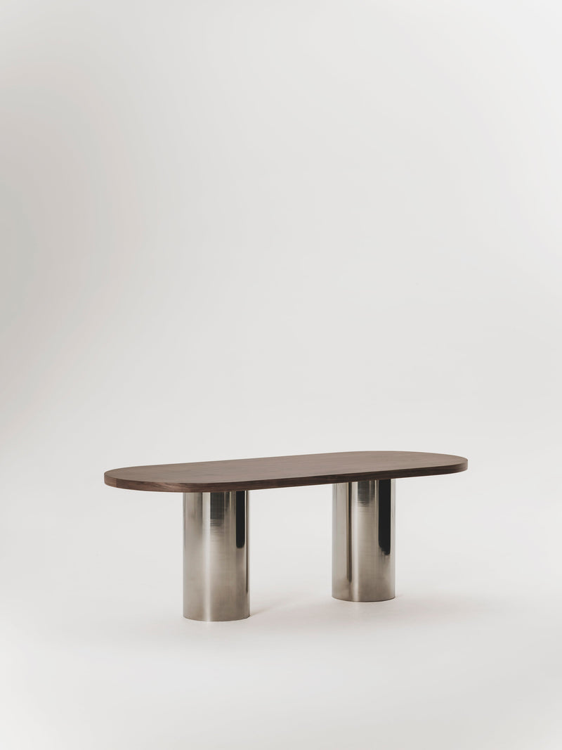 Arsen Dining Table — close-up of wooden top with stainless steel legs