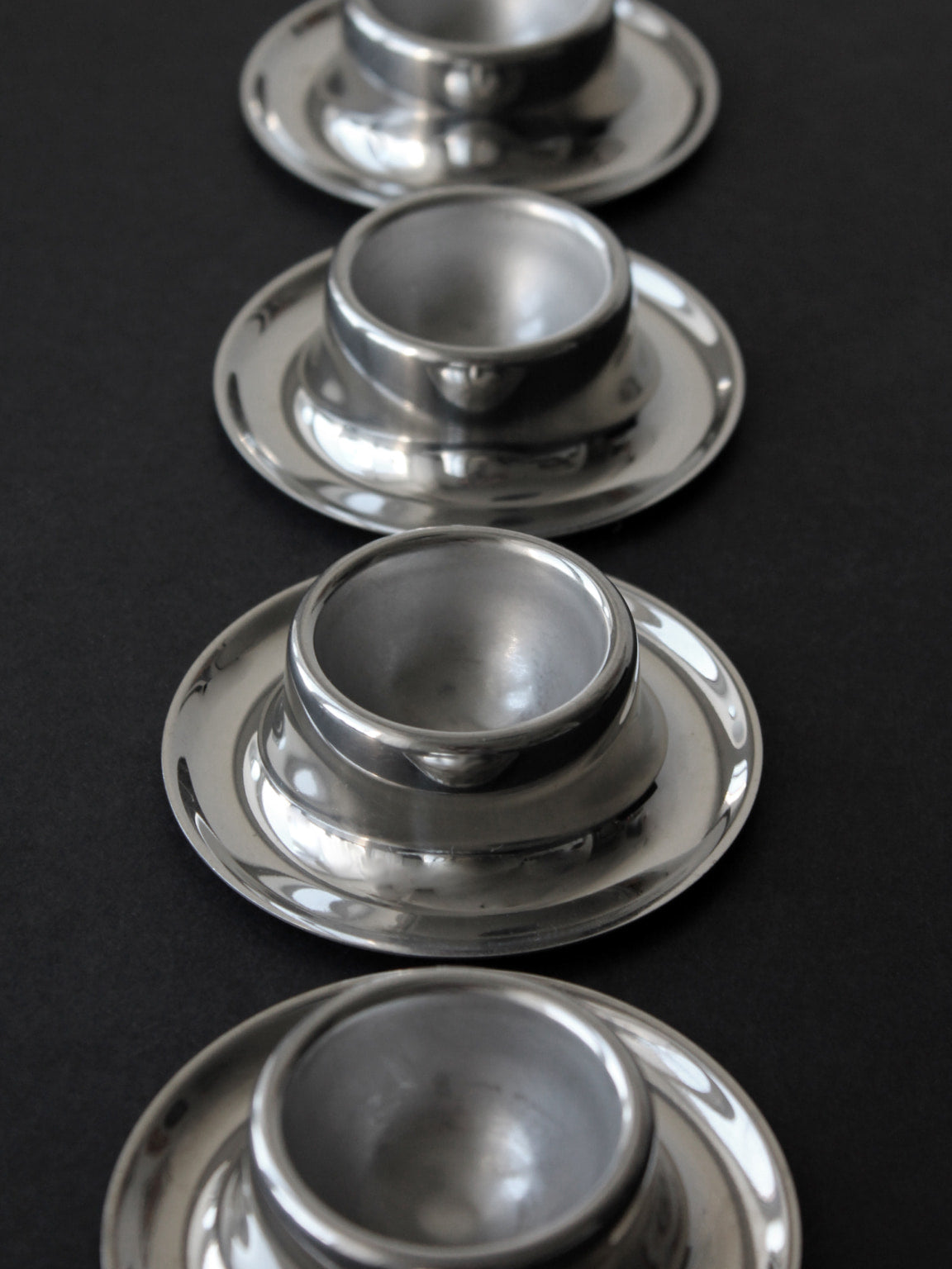 Stainless Steel WMF Egg Cups, Set Of 6, Germany, 1970s — side view showing polished metallic finish