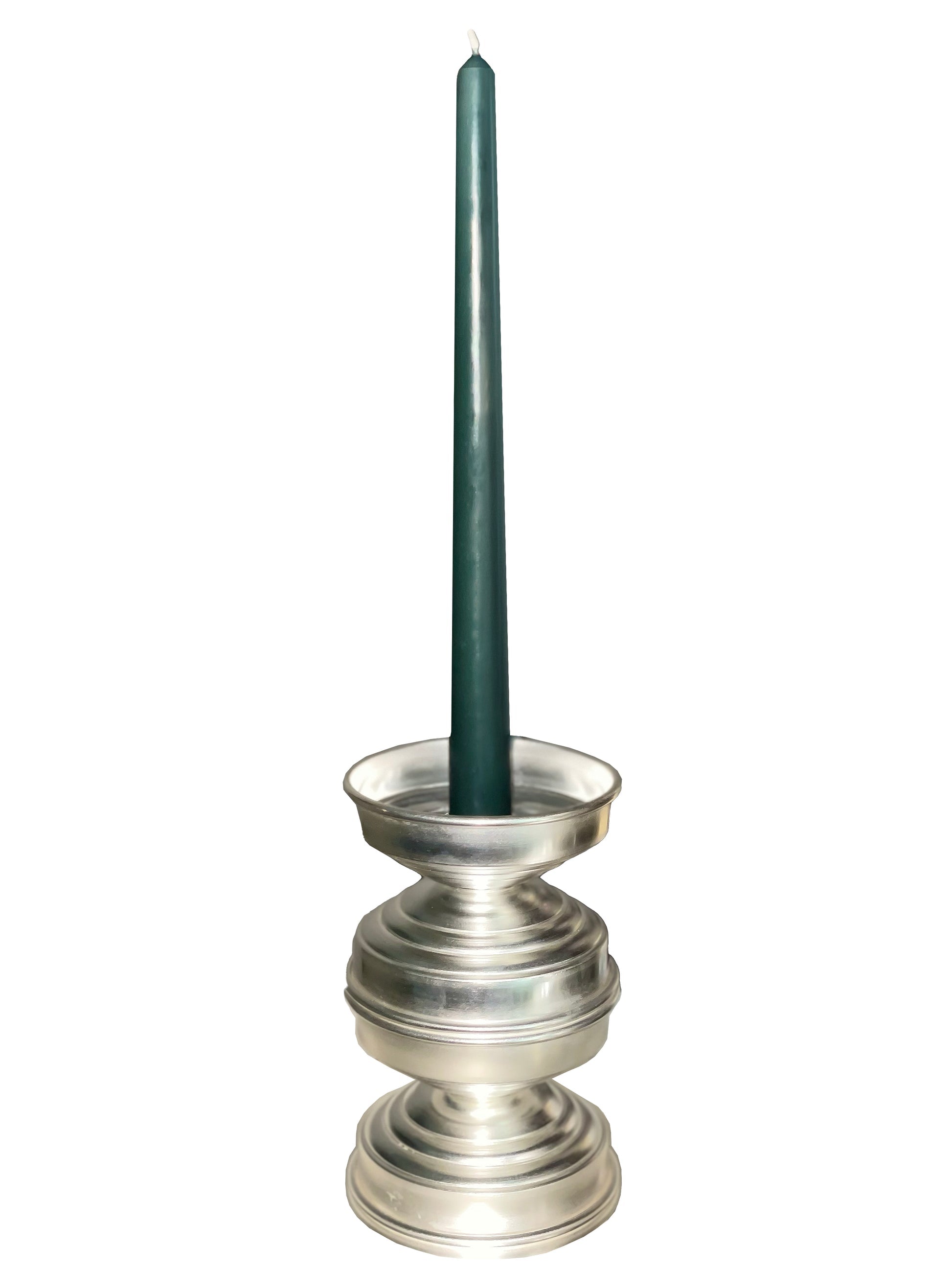 Silver Plated Candle Holders in Brass — close-up of candle holder with green candle