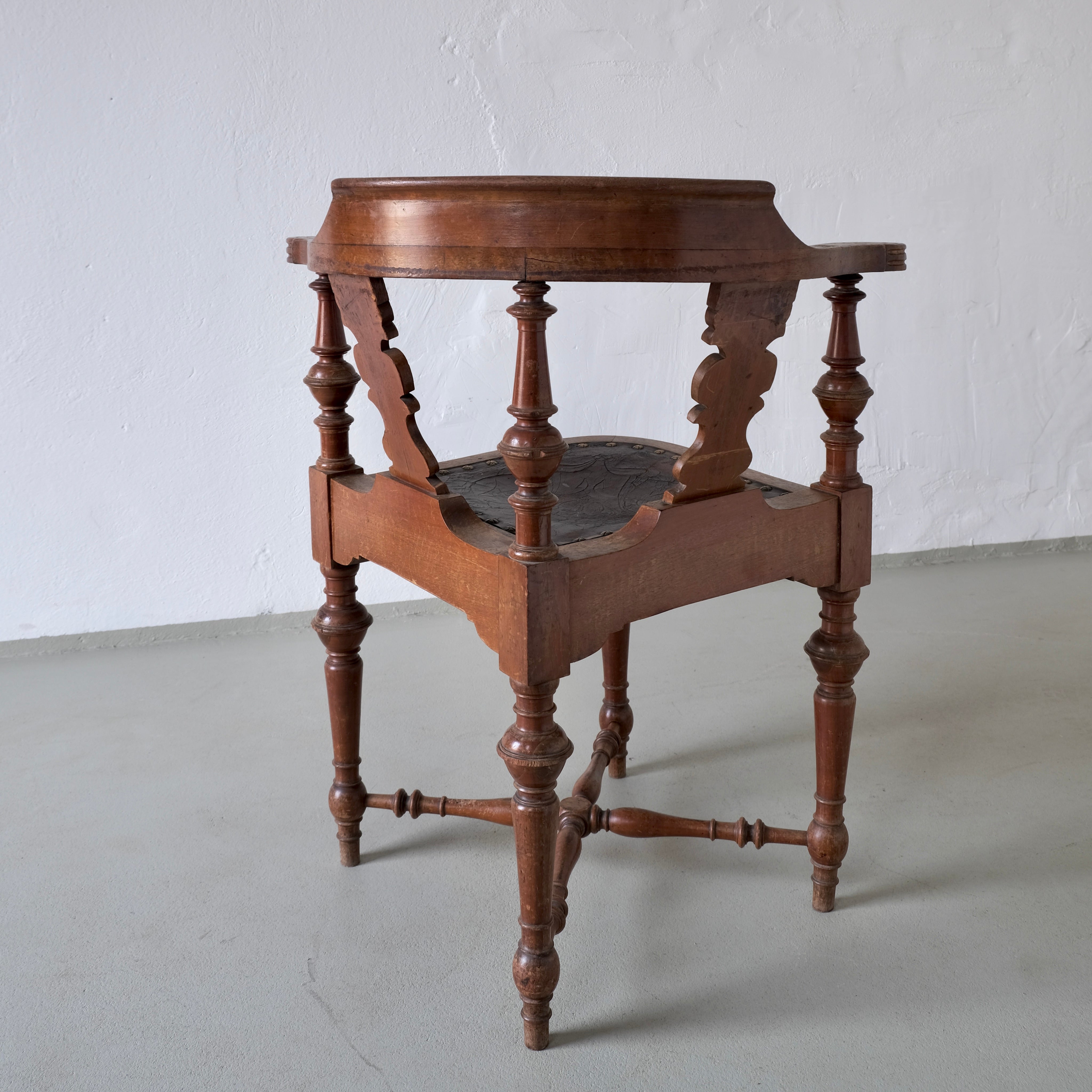 Antique Carved Corner Chair with Leather Seat