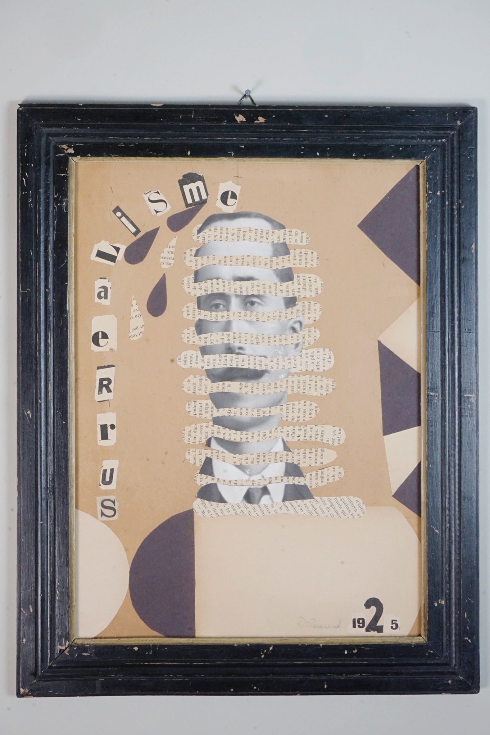Dadaist Collage - Portrait — side angle of framed paper artwork