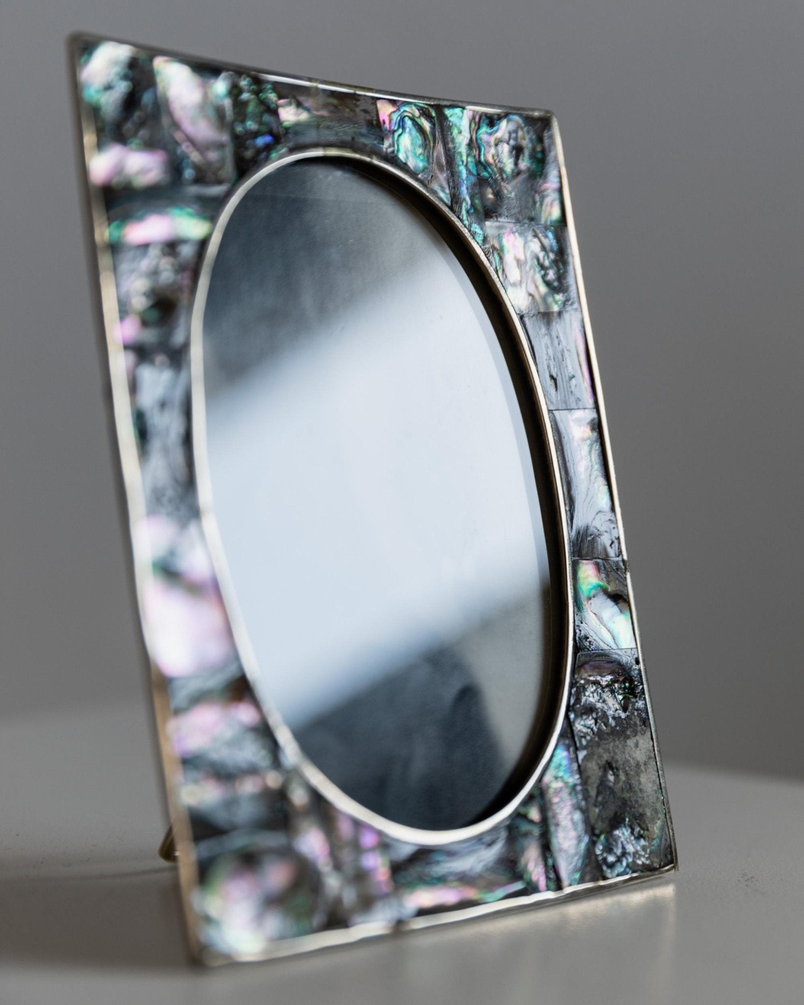 Vintage 1950s Alpaca Silver Picture Frame, Mother of Pearl Details with Oval Photo Opening, Elegant Table Accent, Timeless Gift Idea — close-up