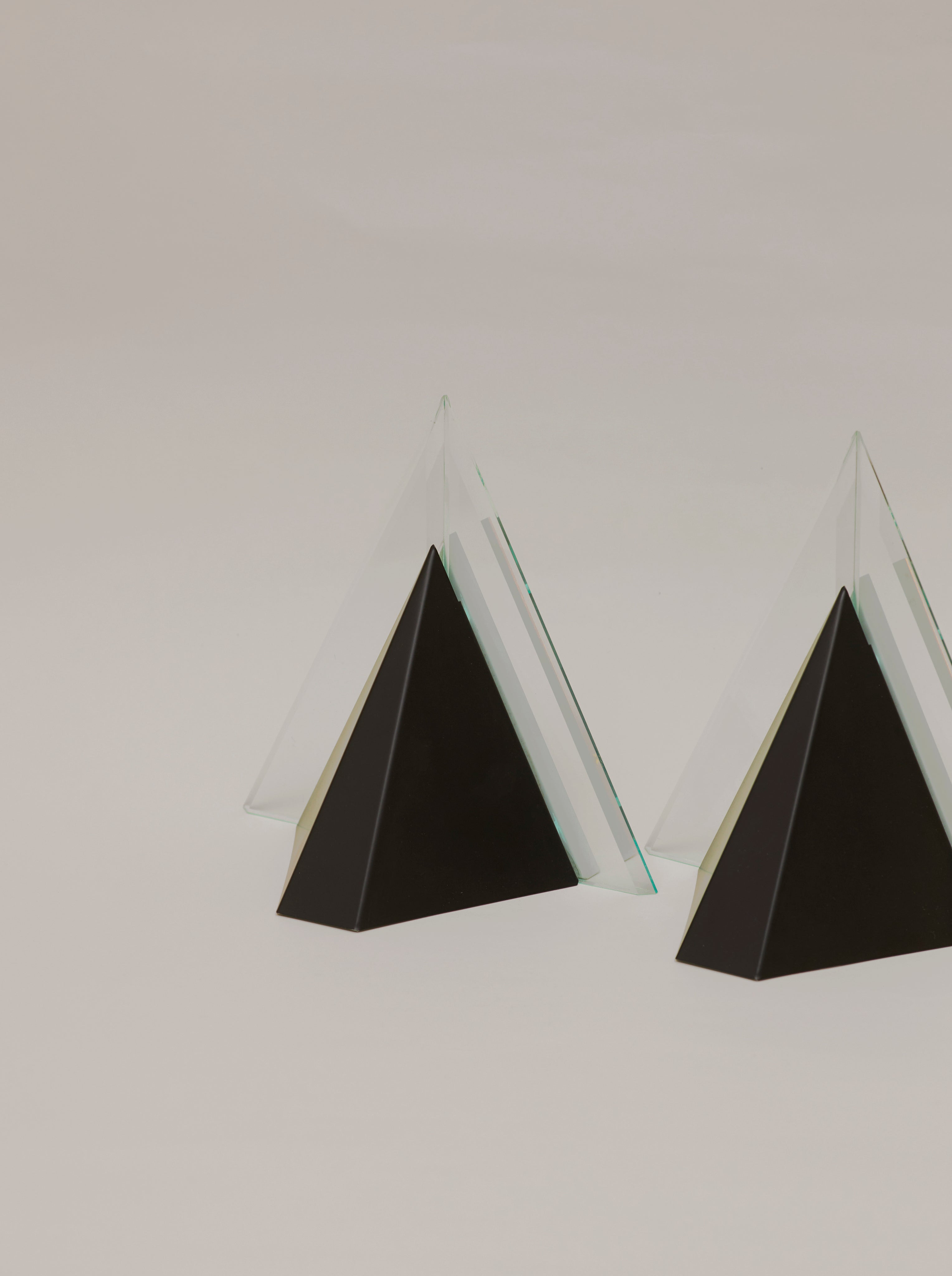 Set of 2 German Postmodern Wall Lights Circa 1980 — angled view showing clear and black glass design
