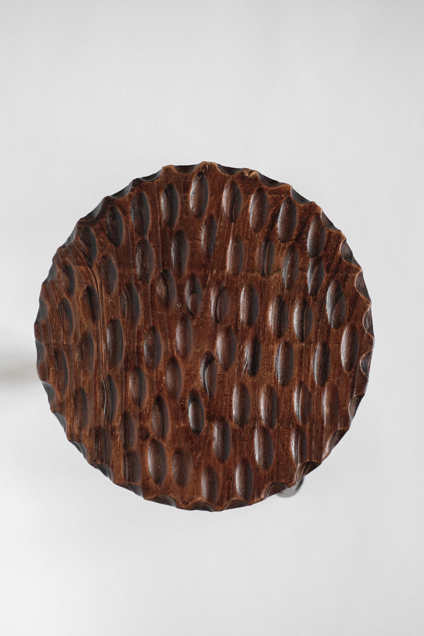 Hand-carved Wooden Tripod Stool — detail view
