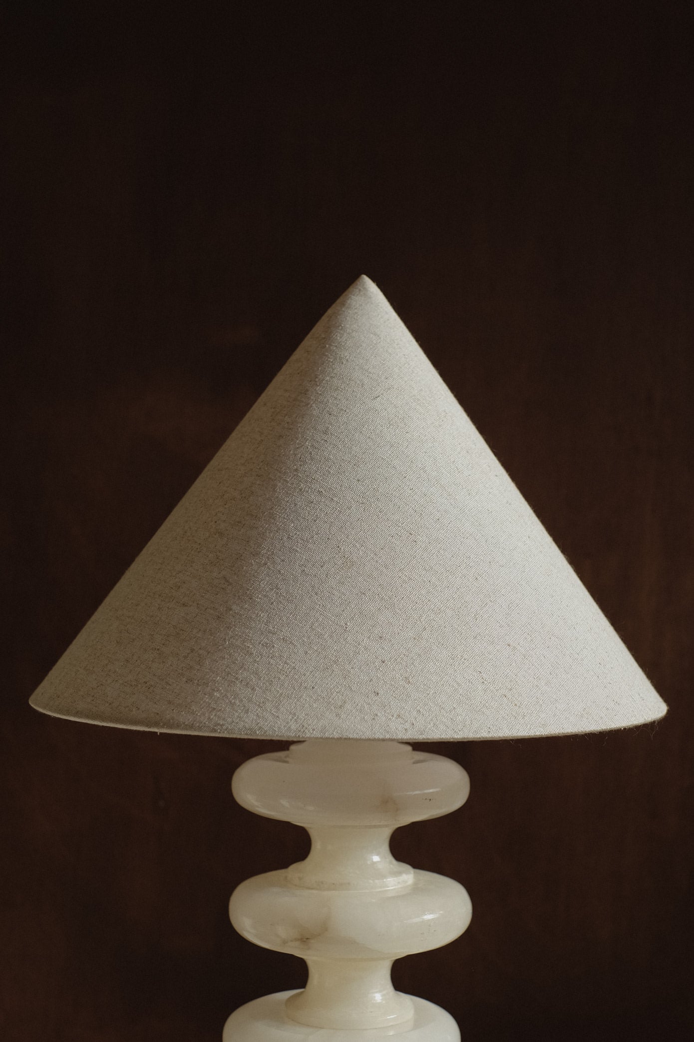 Sculptural Alabaster Table Lamp — side angle showing conical fabric shade
