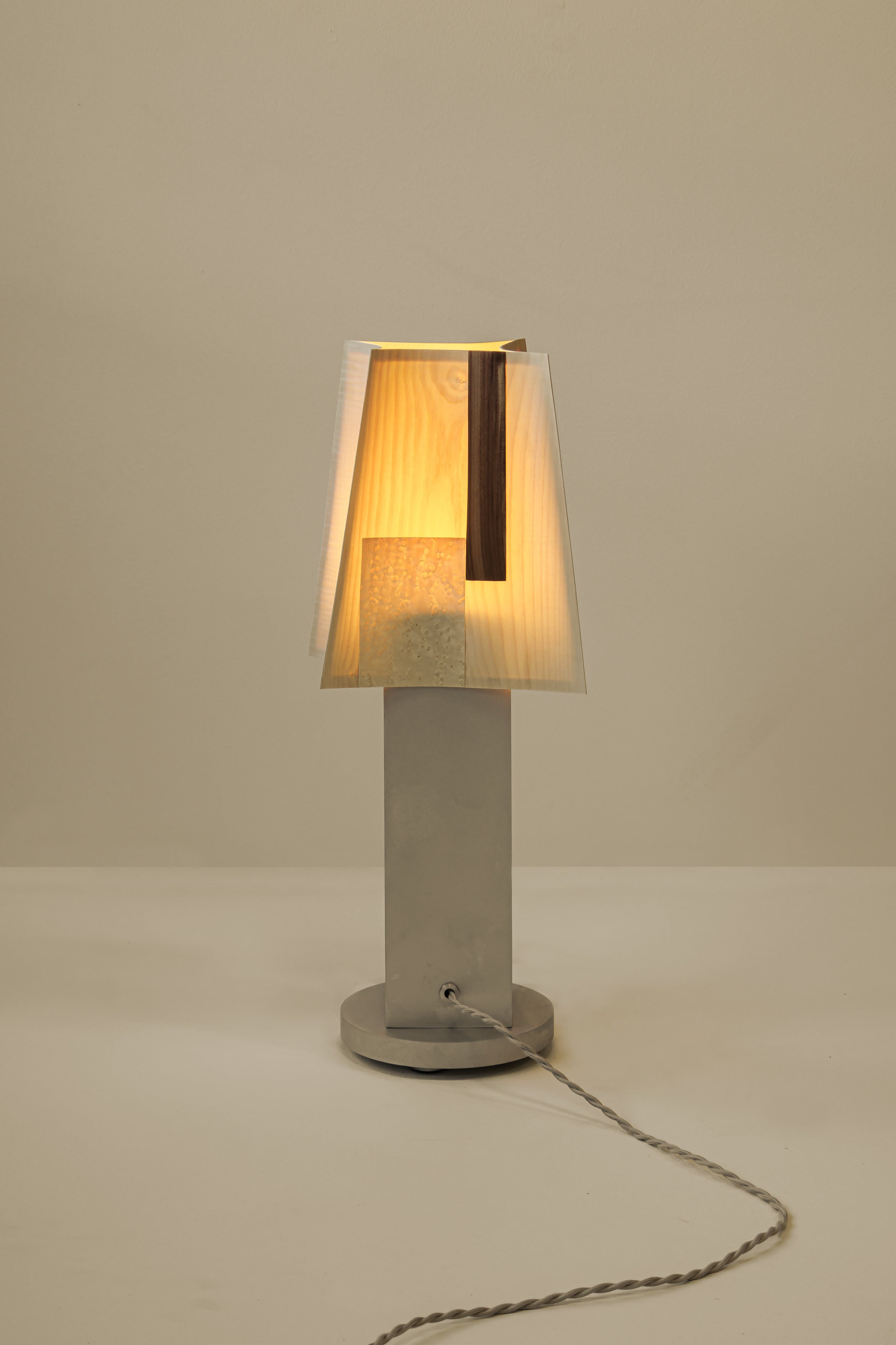 Soft Ply Table Lamp Series — side angle showing layered wood and metal design