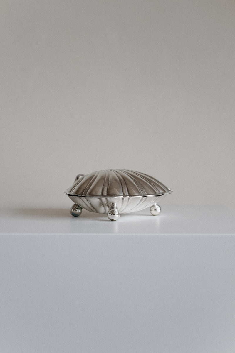 Large Shell Shaped Dish — side view of silver finish on display