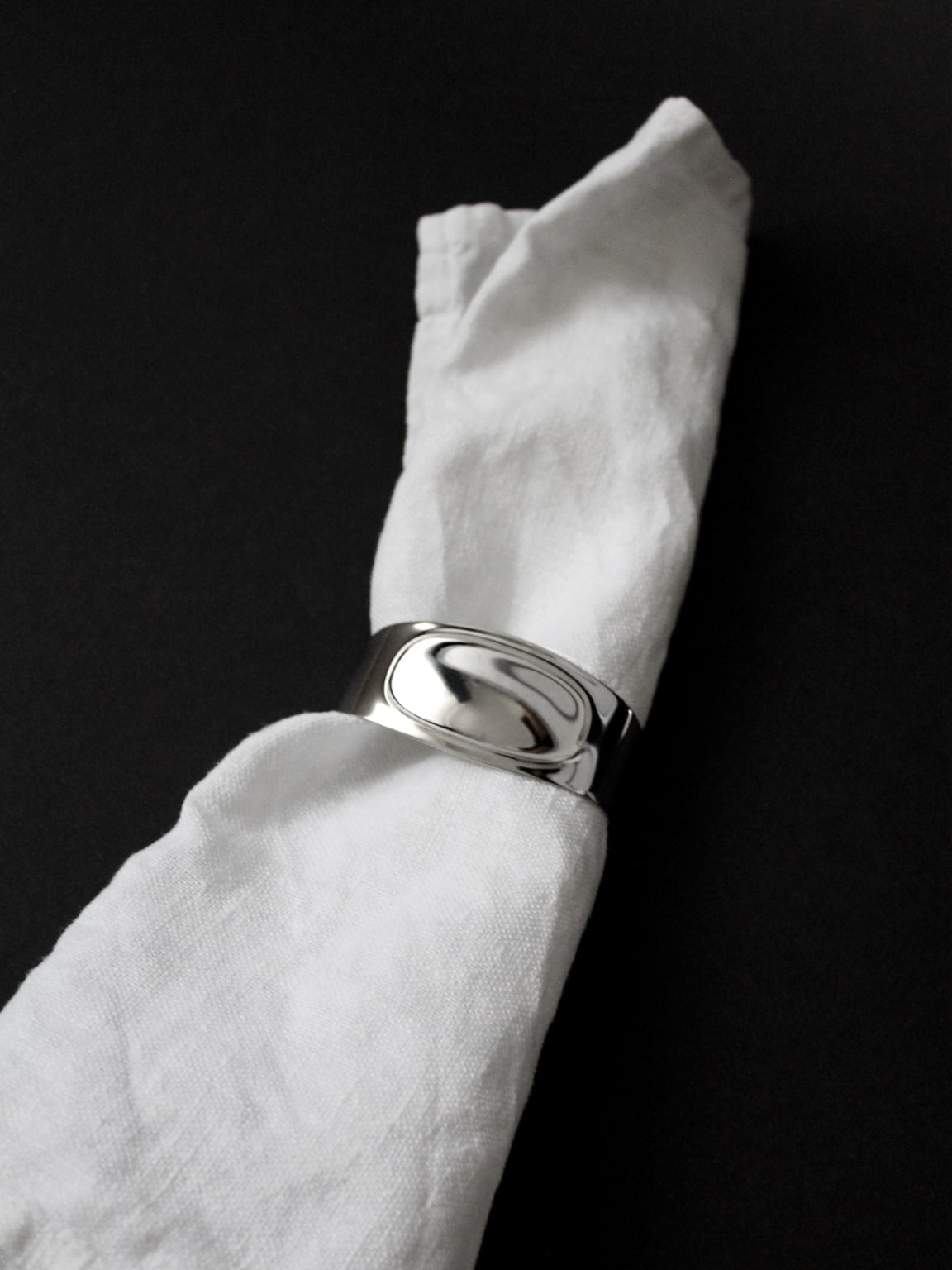 Stainless Steel WMF Napkin Rings, Germany, 1970s — side view with white linen napkin