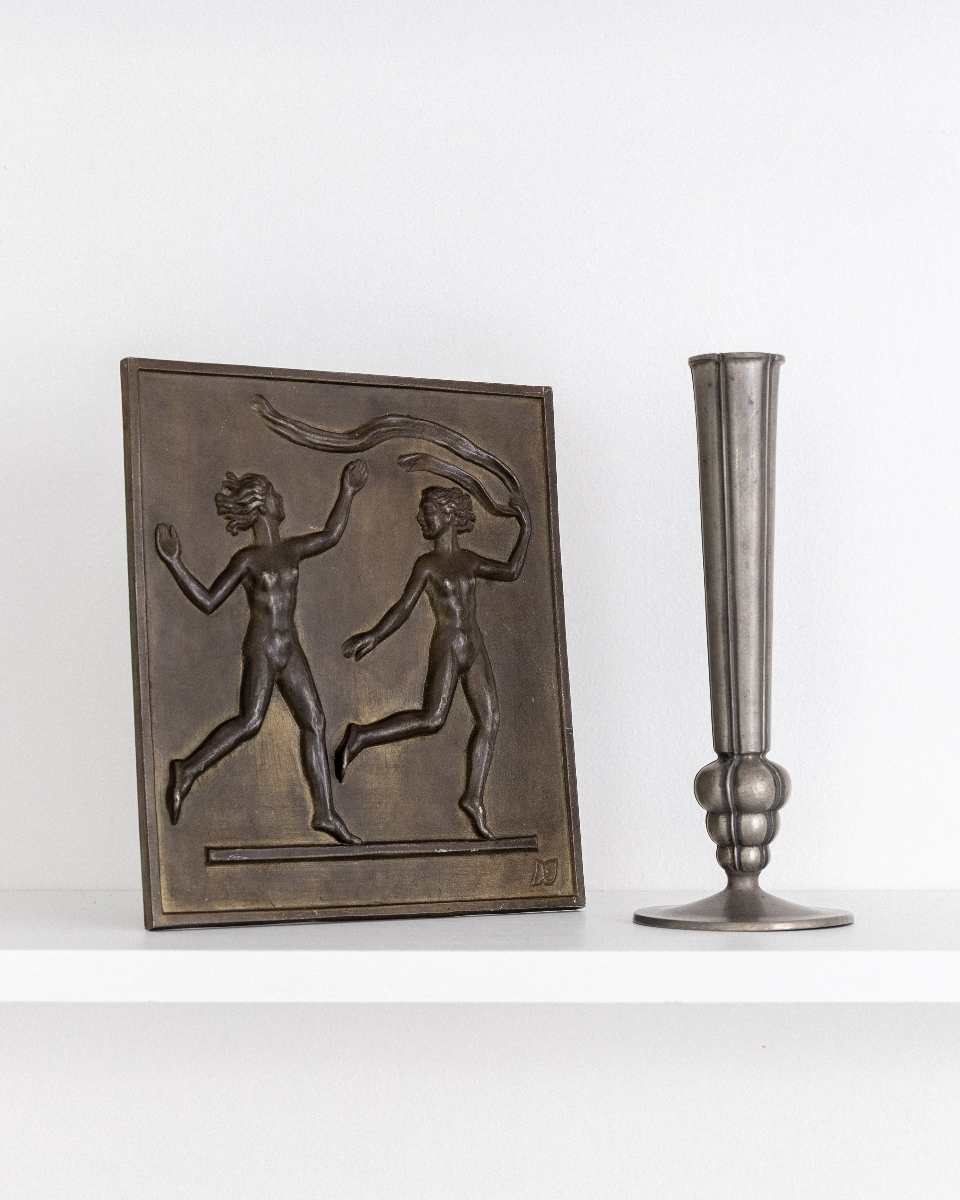 Cast Pewter Vase by Edvin Ollers, 1950 — side view on shelf with bronze plaque