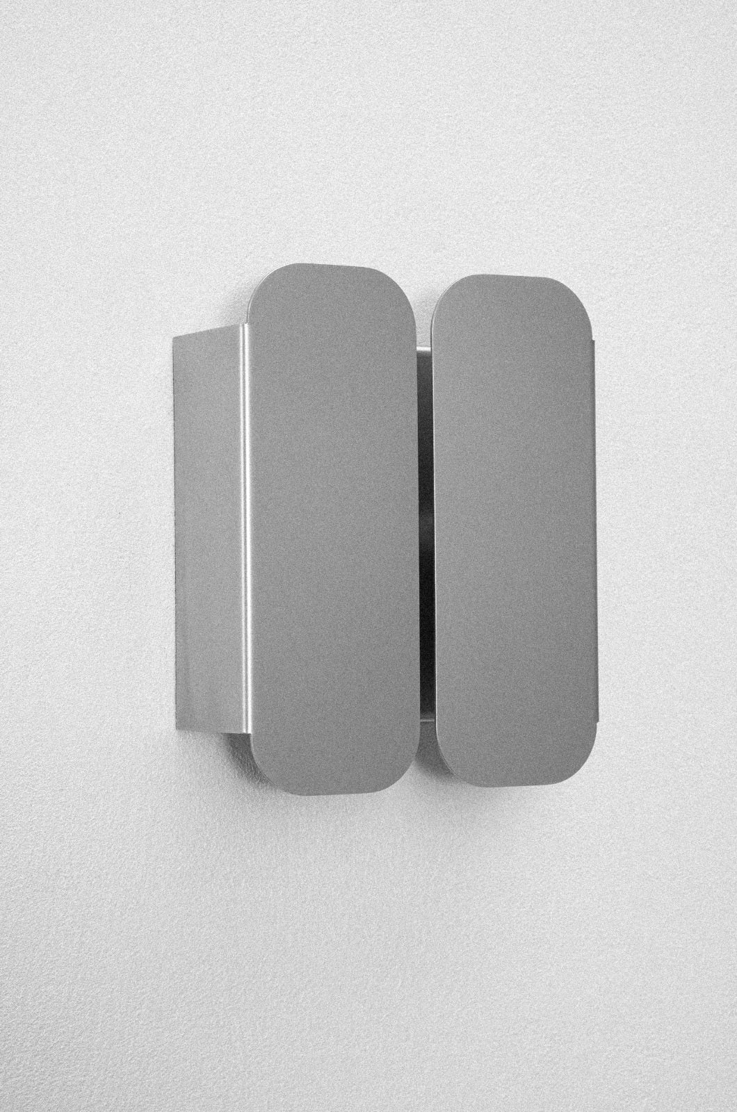 Wall Lamp - 1.0 - Double -Stainless Steel — back view against white wall