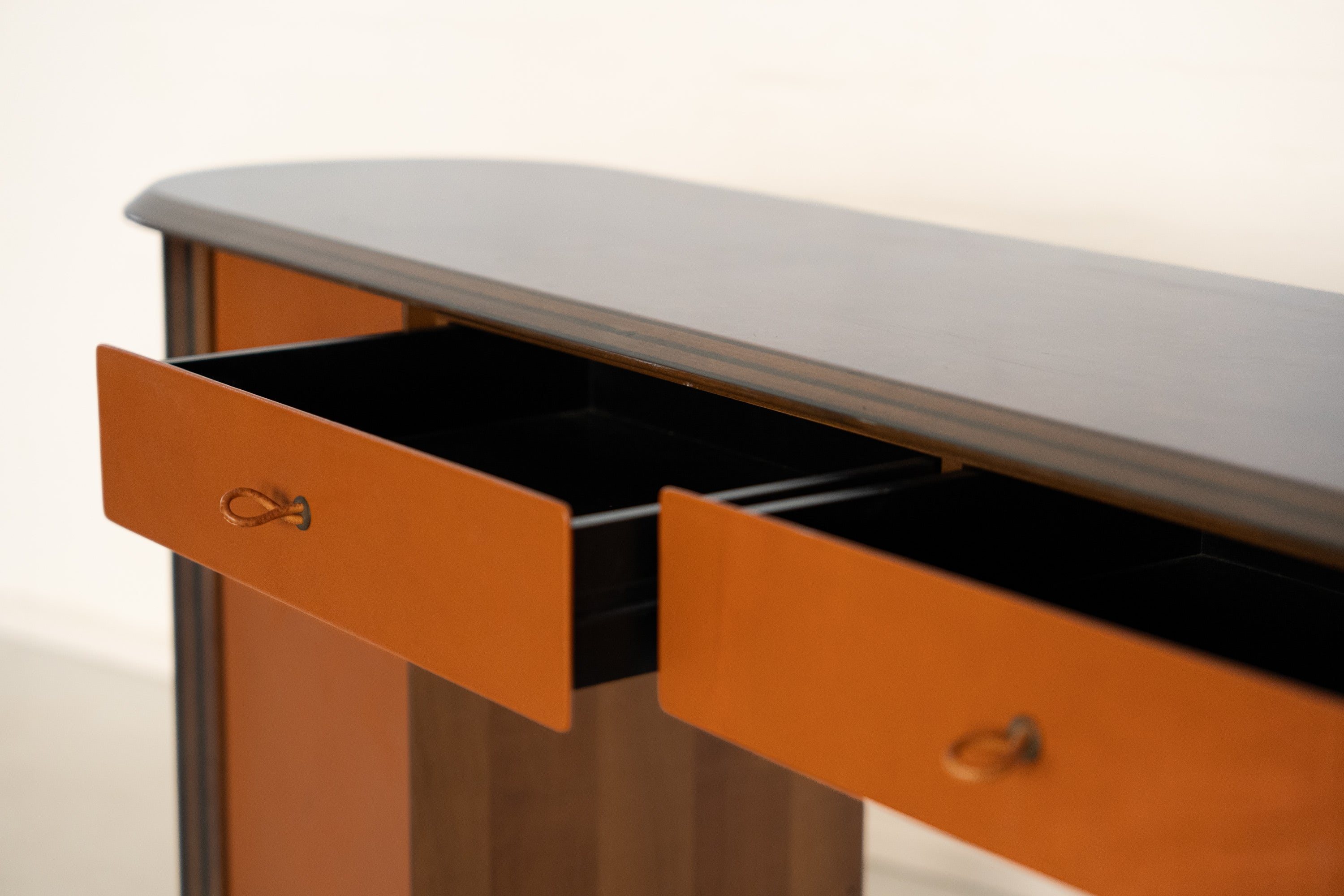 Artona Console by Afra & Tobia Scarpa for Maxalto — side angle showing open orange drawers