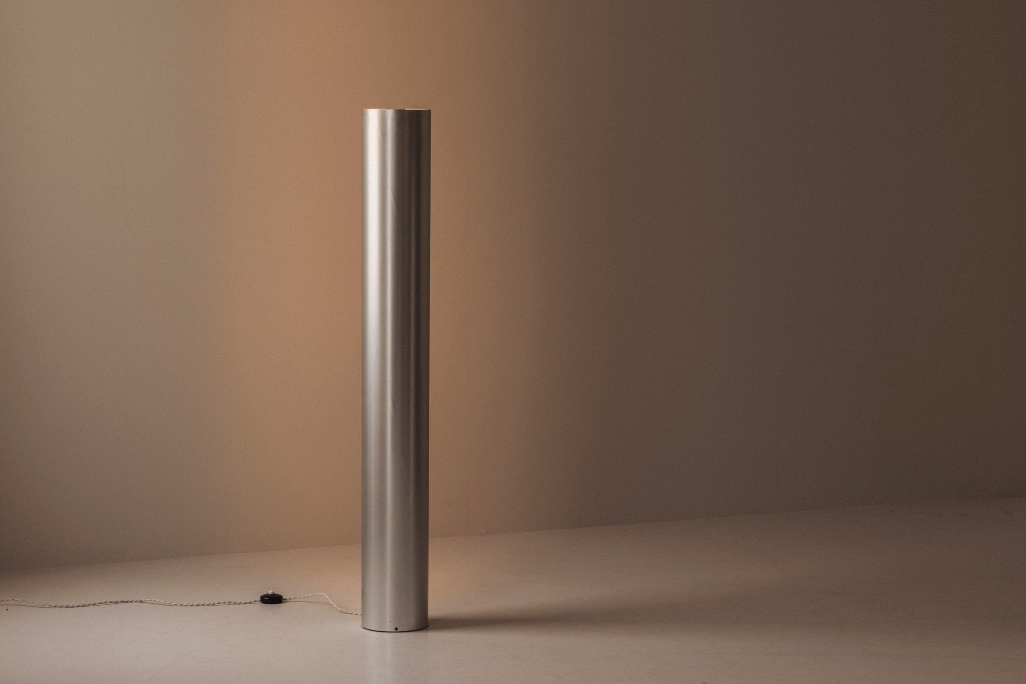 Sculptural metal tube floor lamp, Italy 1960s — lifestyle setting