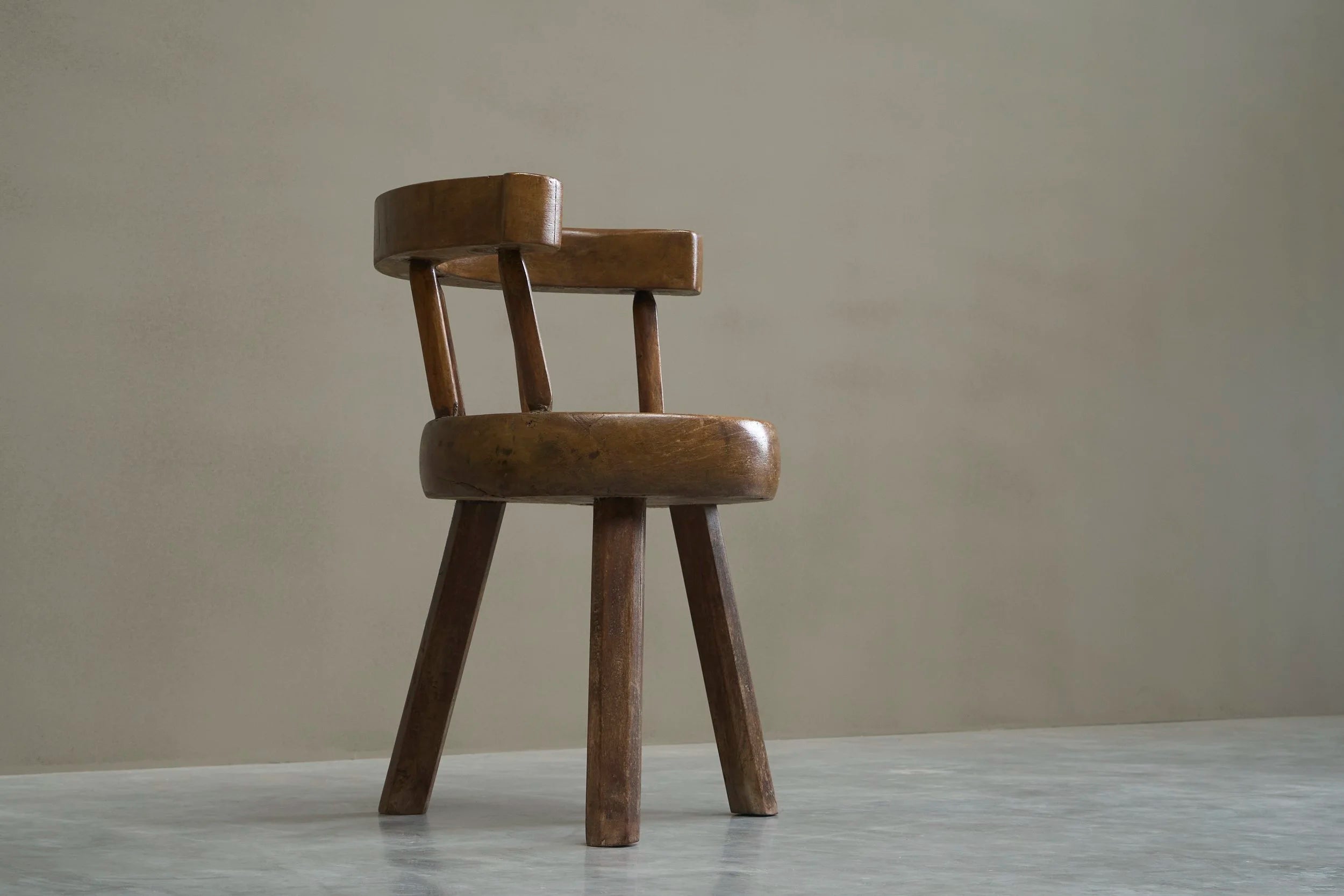A Sculptural Three-Legged Provincial Vernacular Chair in Heavy Solid Oak France Early 20th Century — close-up