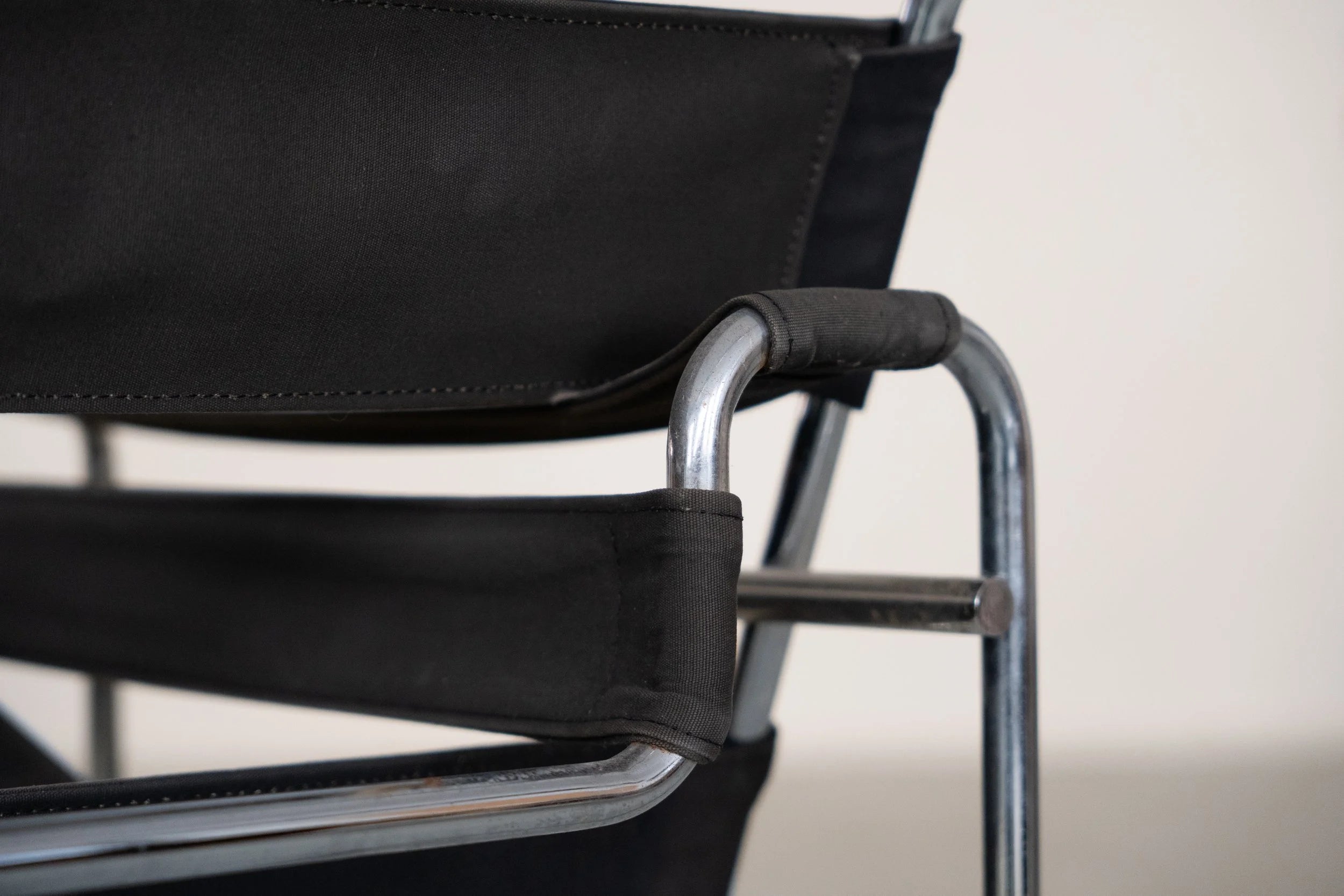 Wassily Chair by Marcel Breuer for Gavina — side angle showing black canvas and chrome frame