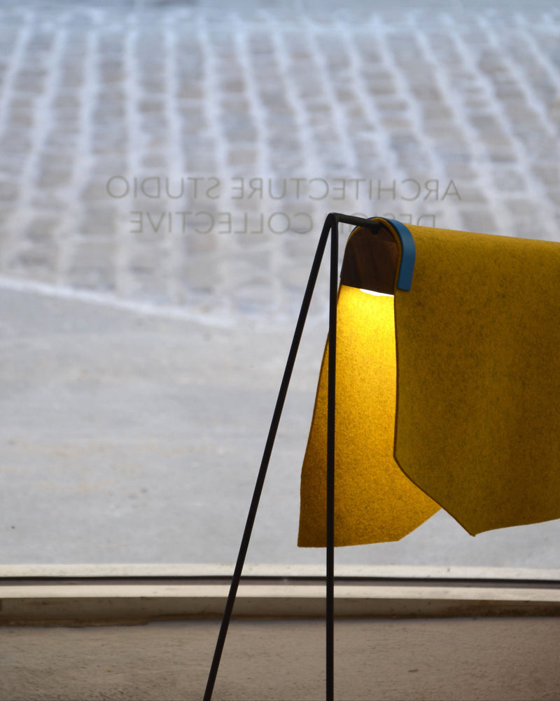Lomo Lamp' by Natural Urbano — close-up of yellow felt shade and metal frame