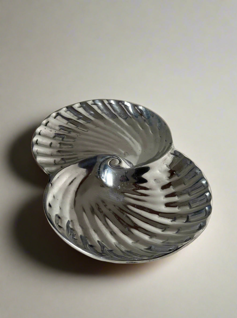 Silver swirl decorative dish with nautilus shell spiral design
