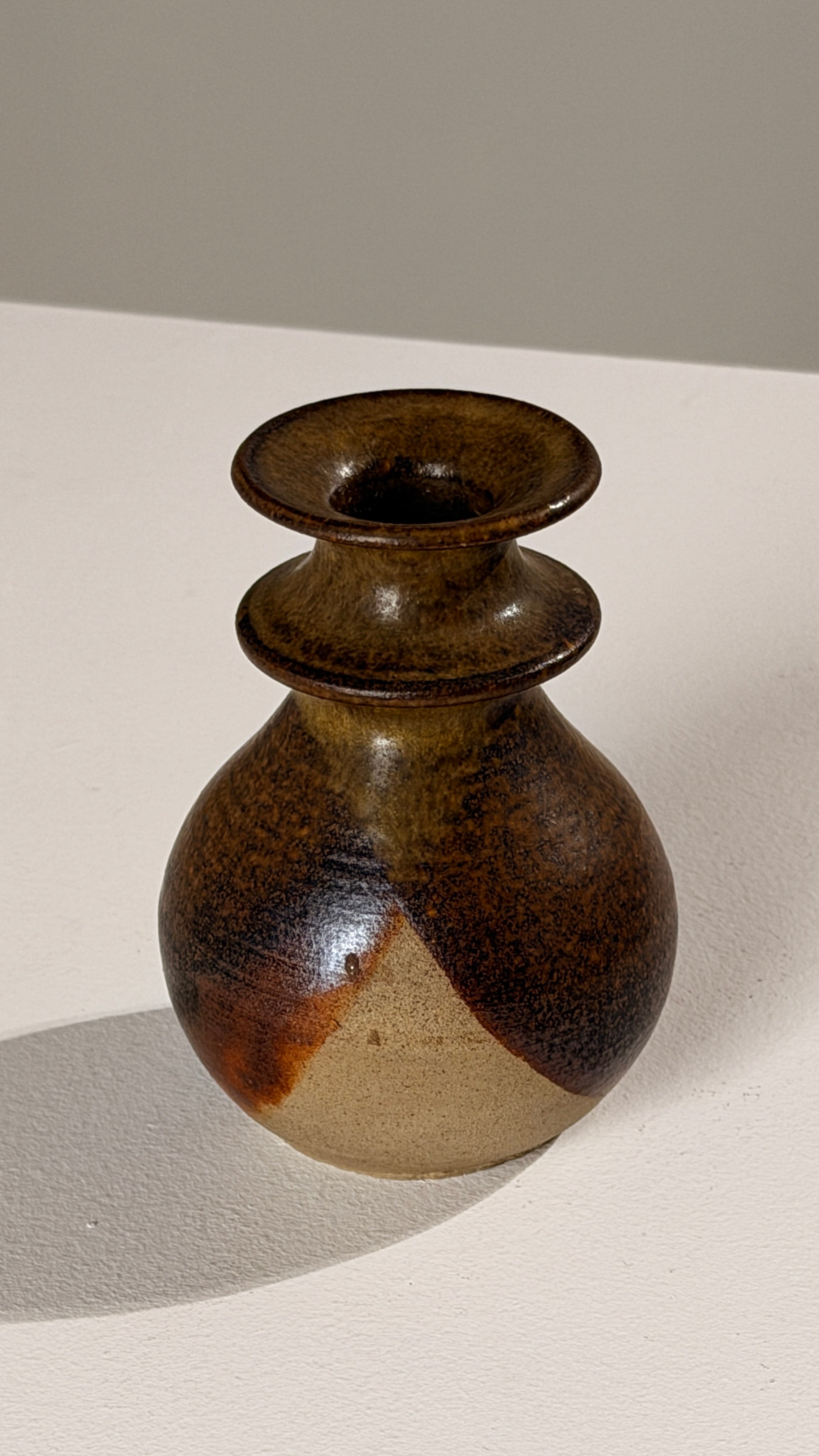 Stoneware Candleholder, France, circa 1960 — side angle showing earthy tones
