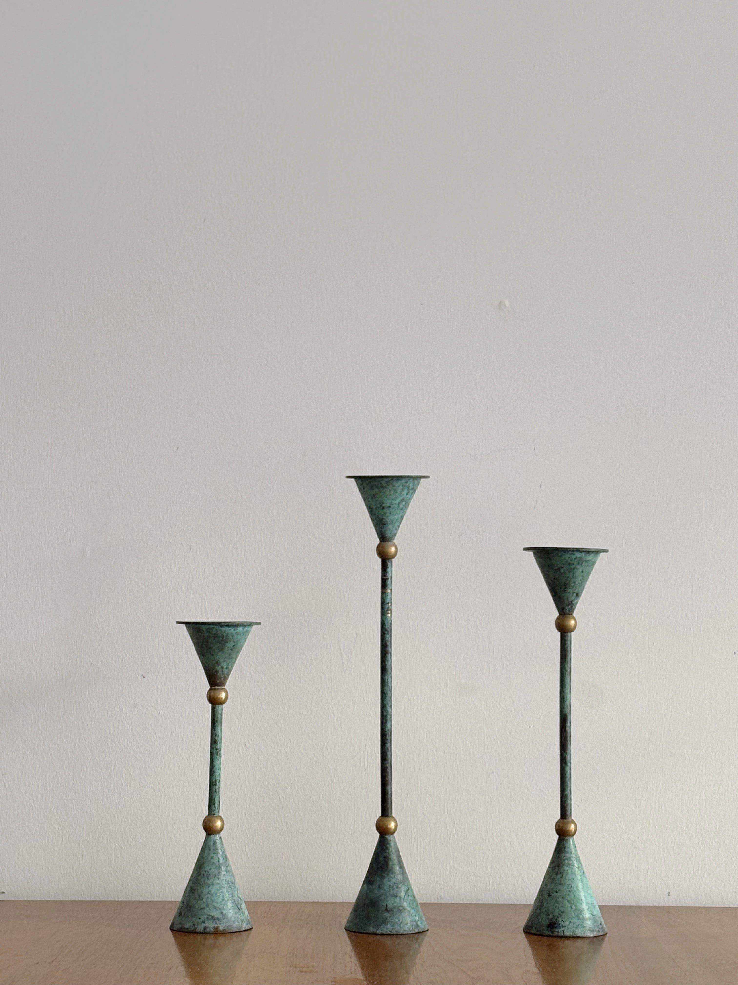 Set of 3 Postmodern Candleholders — side angle showing patinated metal finish
