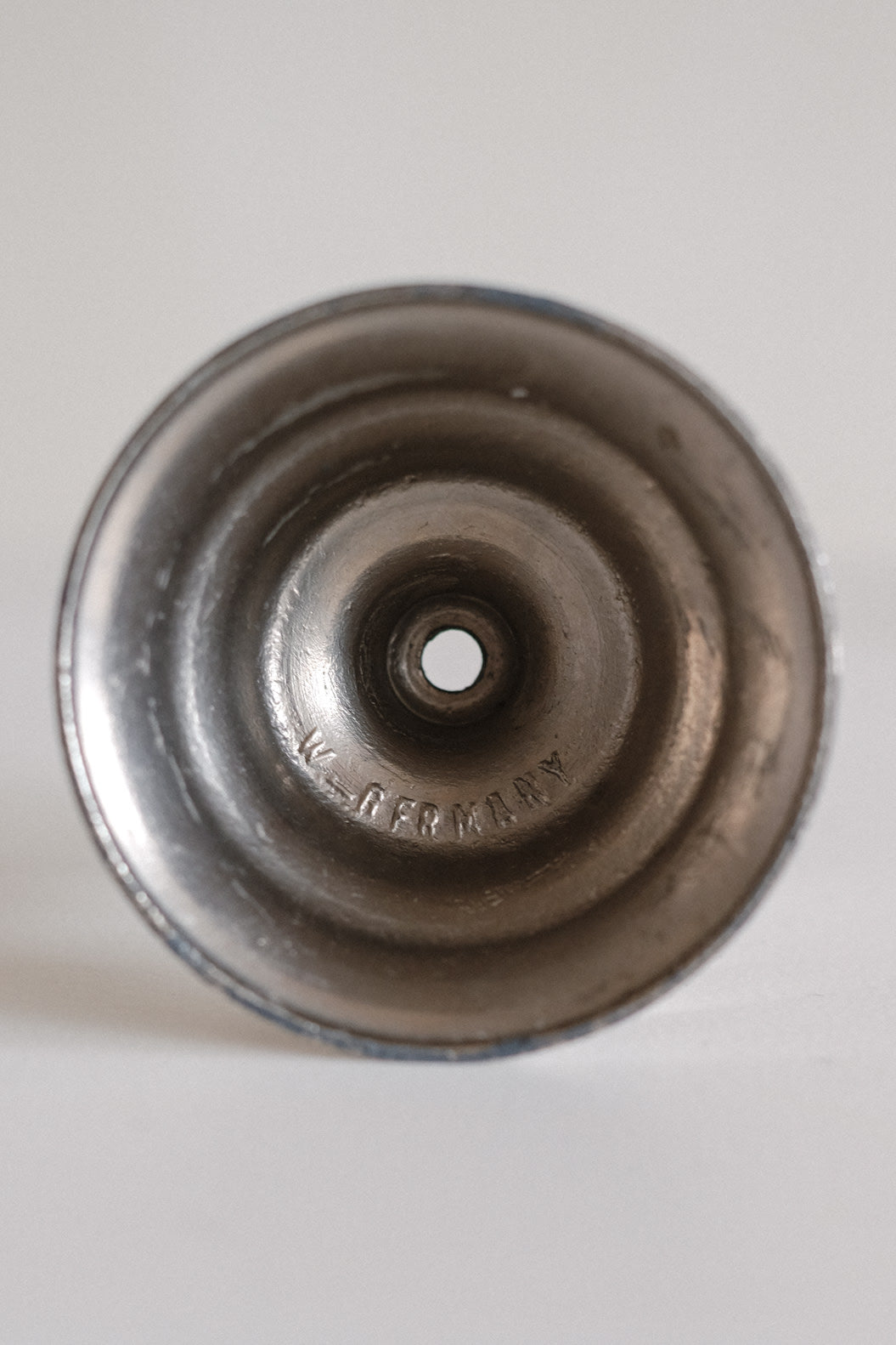 Set of 2 Candle Holders — underside view of metal base