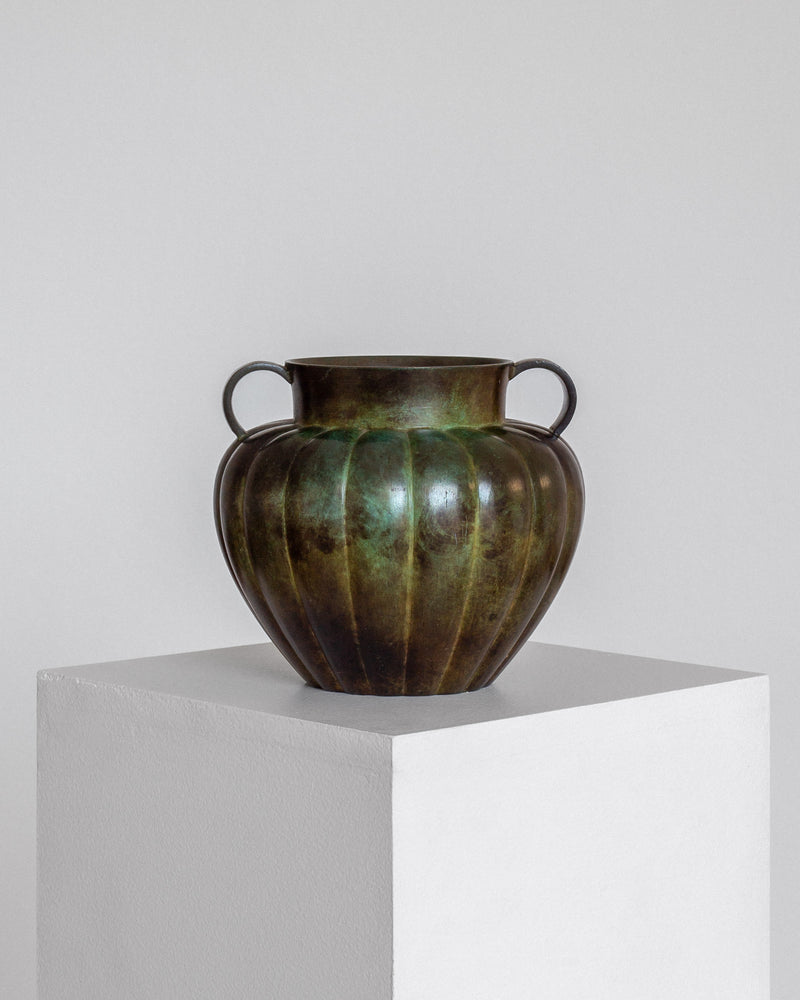 Swedish Art Deco Bronze Vase by GAB, 1930s — front view on white pedestal