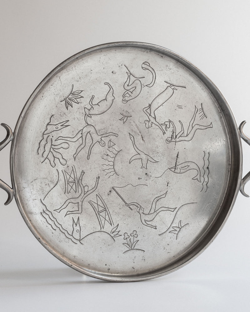Art Deco pewter tray detail showing engraved aquatic motifs