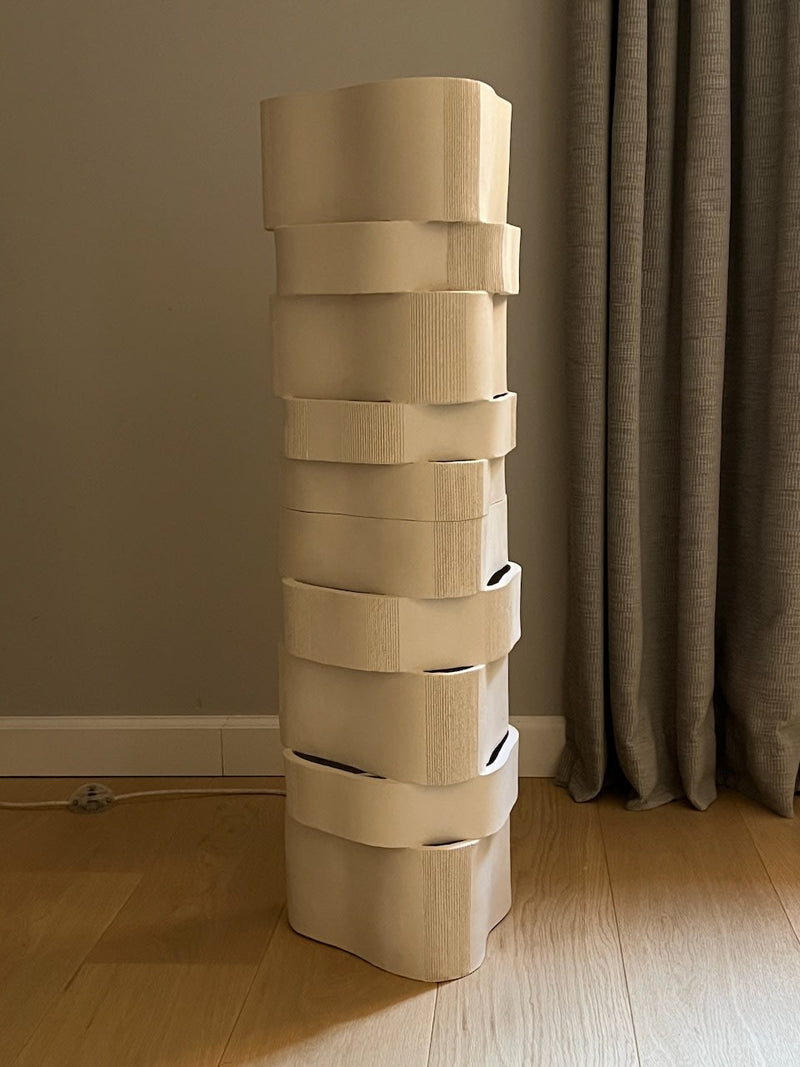 Stacked ceramic cylinder floor lamp showing sculptural form detail