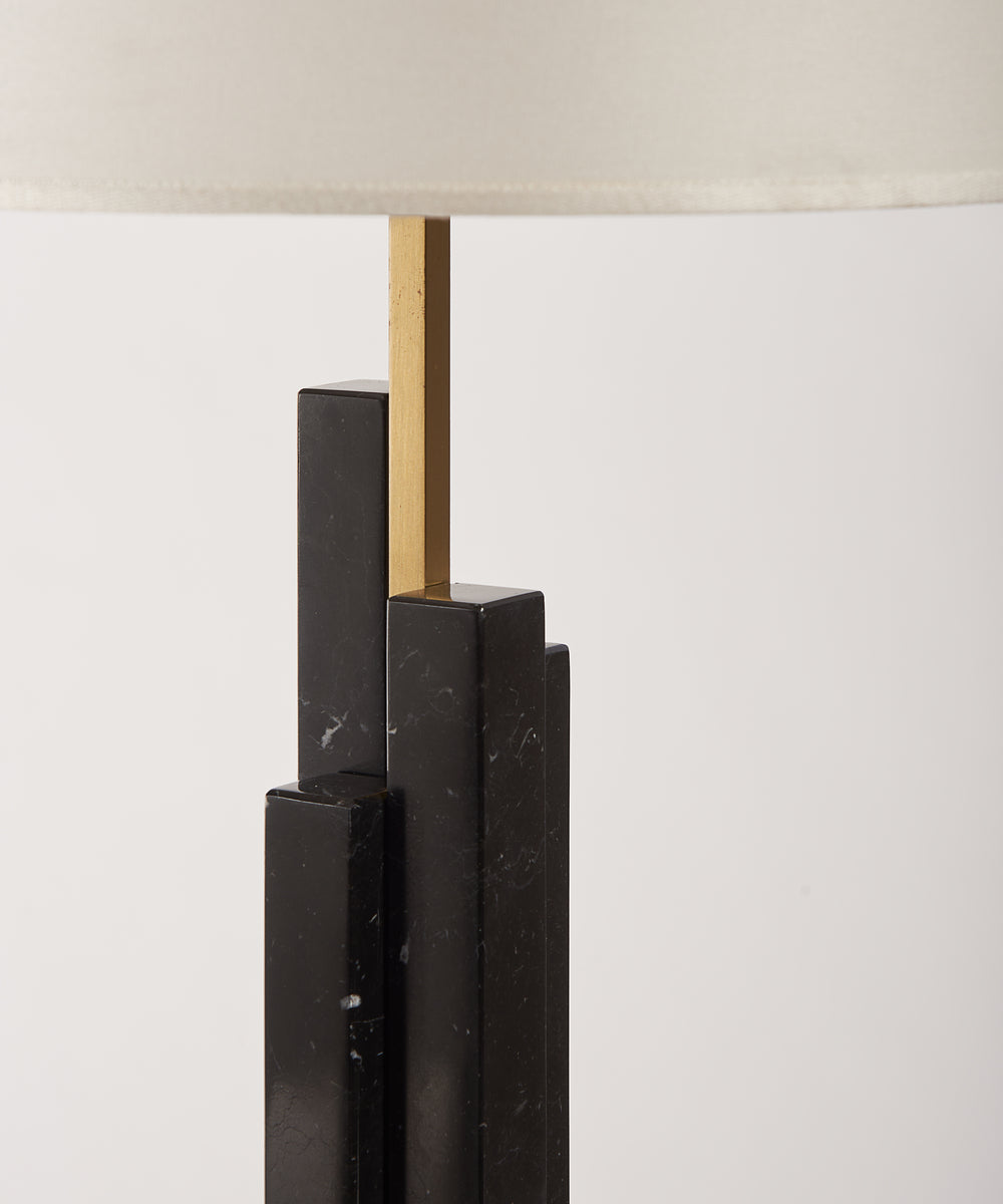 SKYLINE Table Lamp in Black Marble and Satin Brass — side angle showing stacked marble base