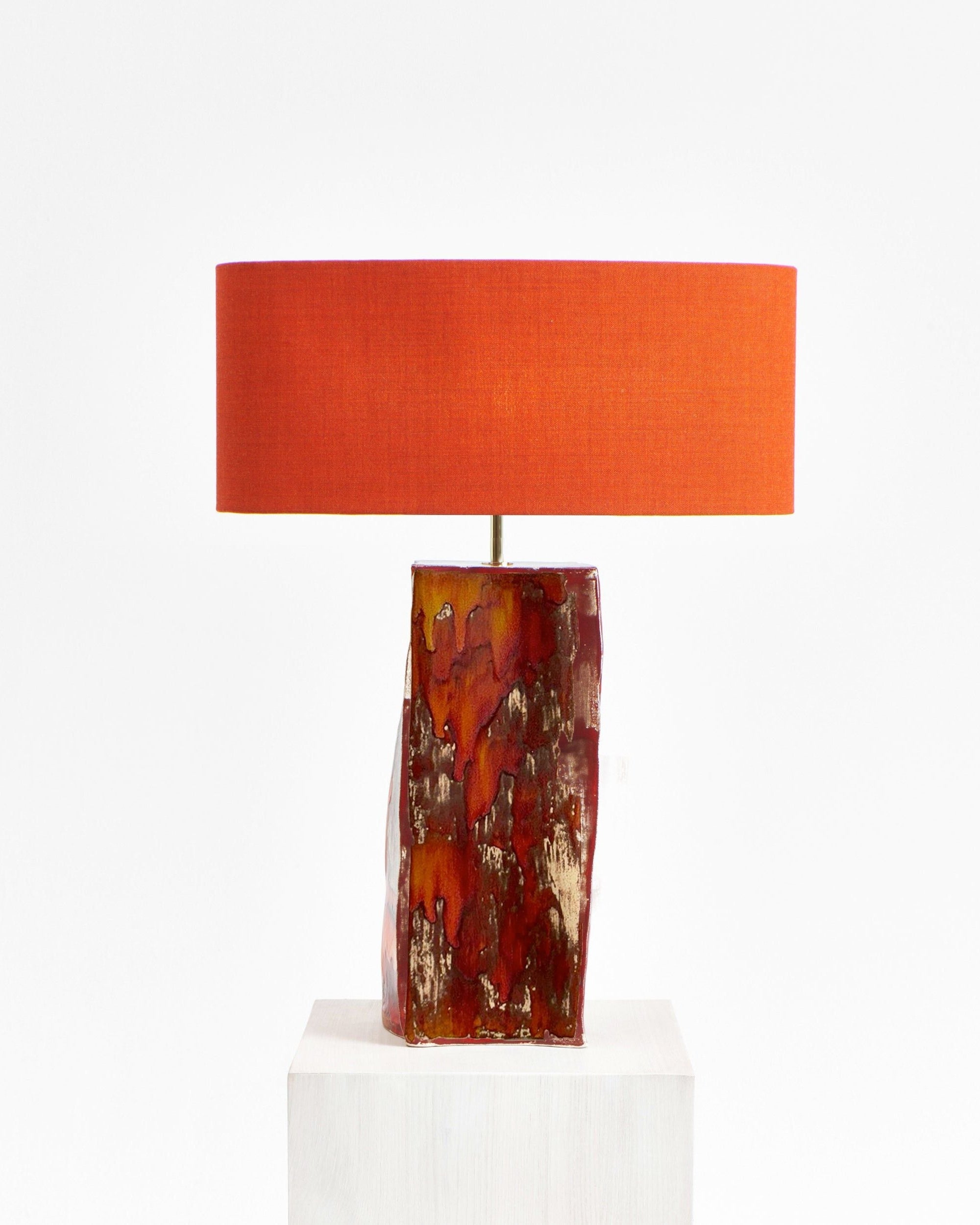 Rectangular Ceramic Lamp — front view with orange fabric shade
