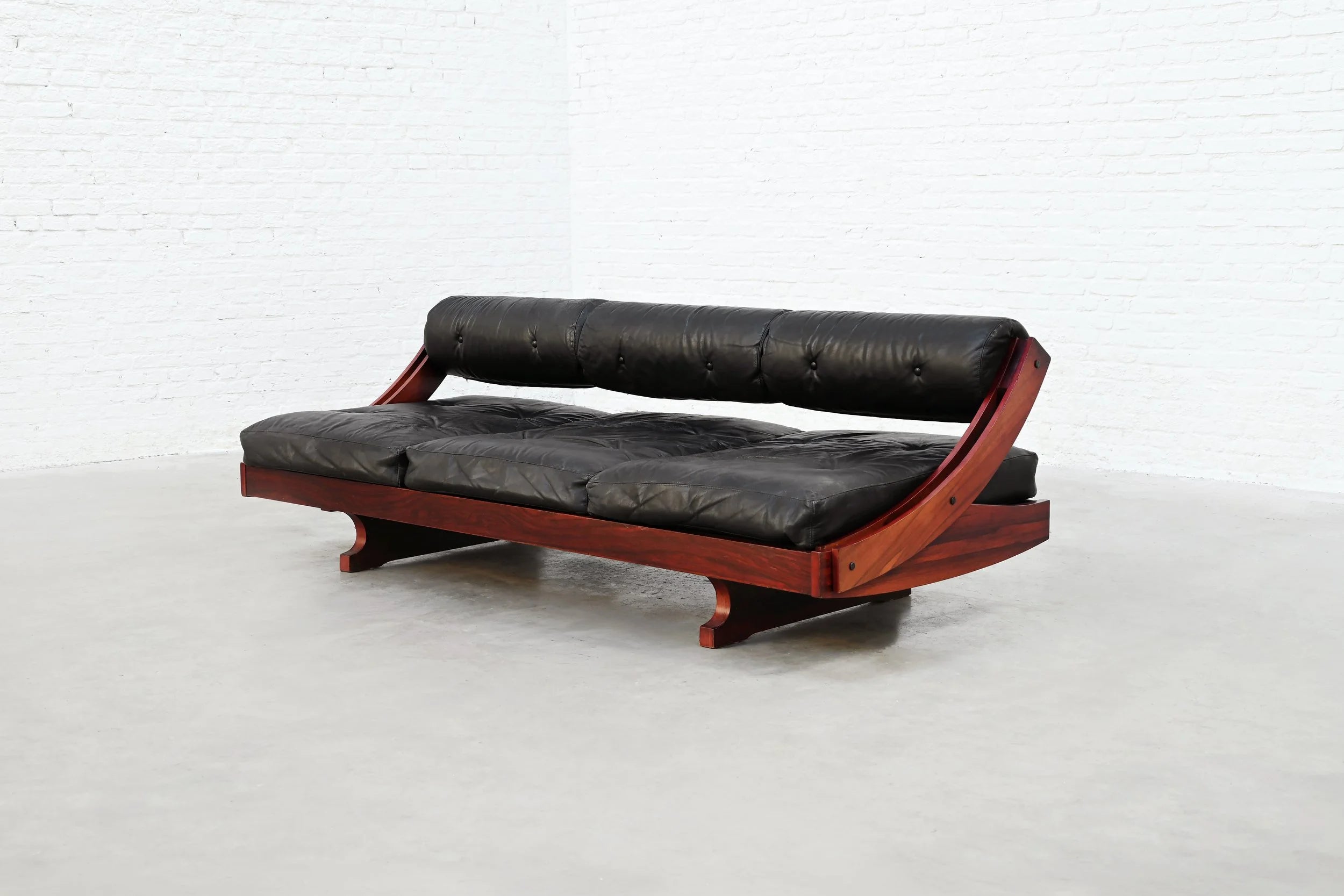Gianni Songia GS195 Sofa / Daybed for Sormani — angled view with black leather upholstery