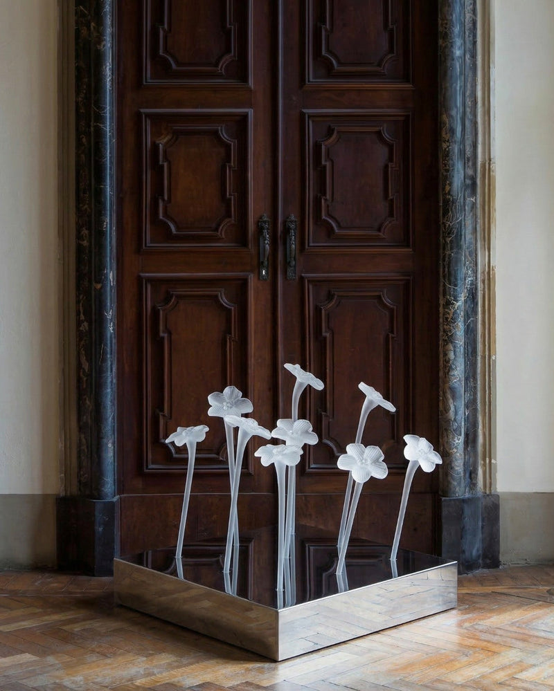 Mirror polished stainless steel vase with mouth-blown crystal flowers by Lucie Claudia Podrabska | The Oblist
