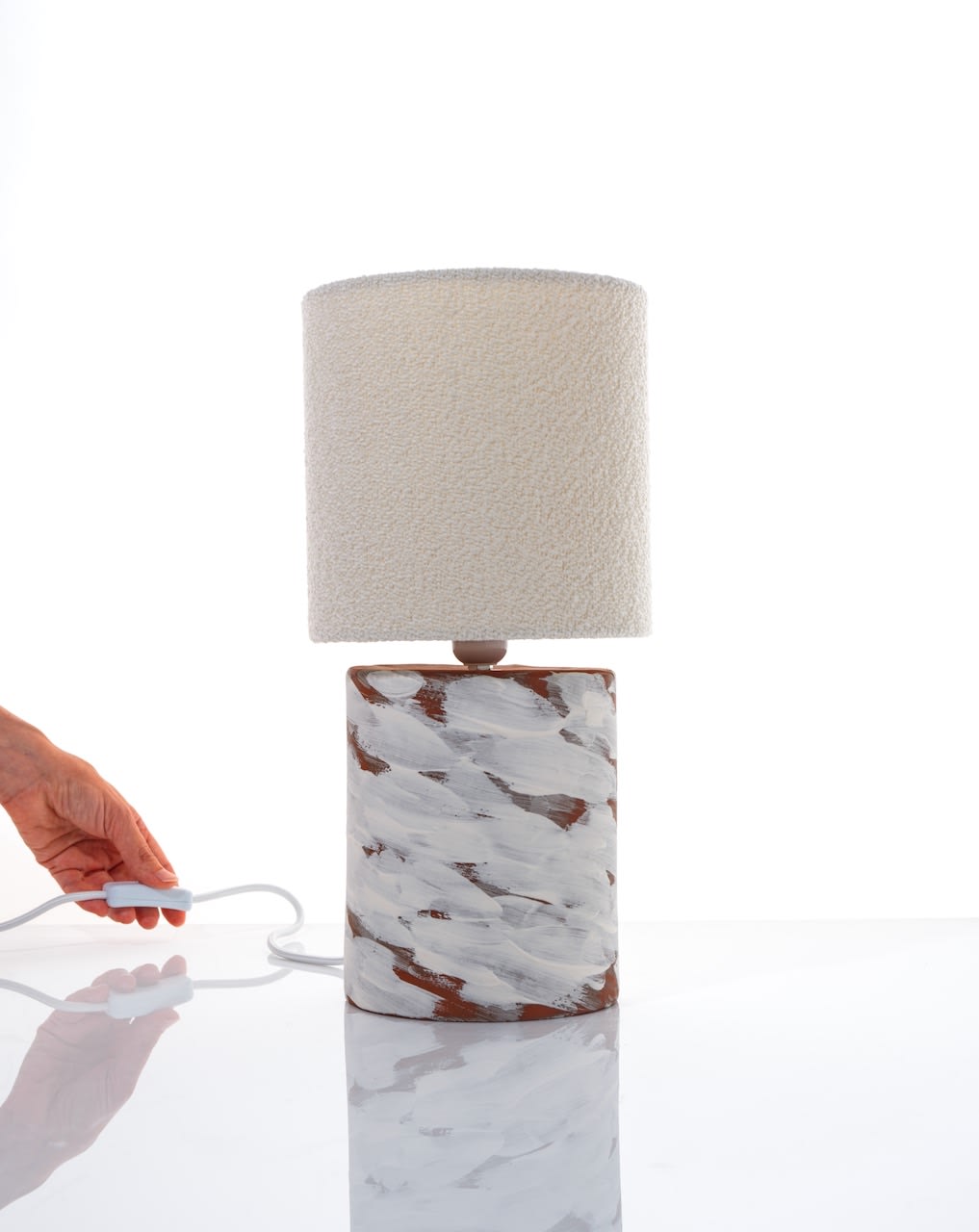 White Wind Table Lamps in Ceramic — side angle showing textured ceramic base