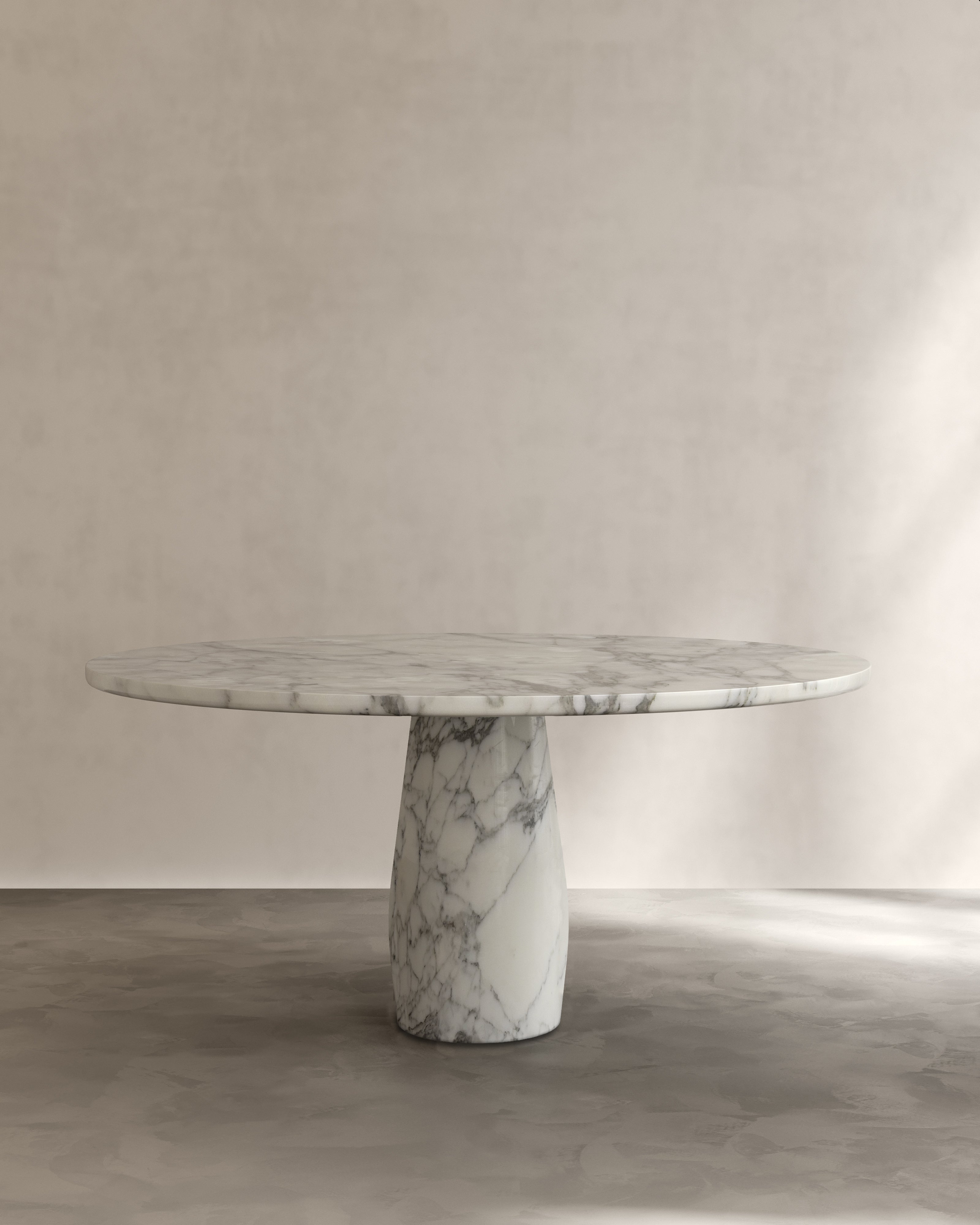 Raffaella Table III — back view of round marble dining table
