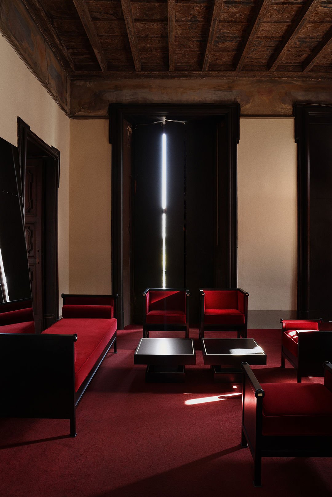 Keys Armchair — red fabric in modern living room setting