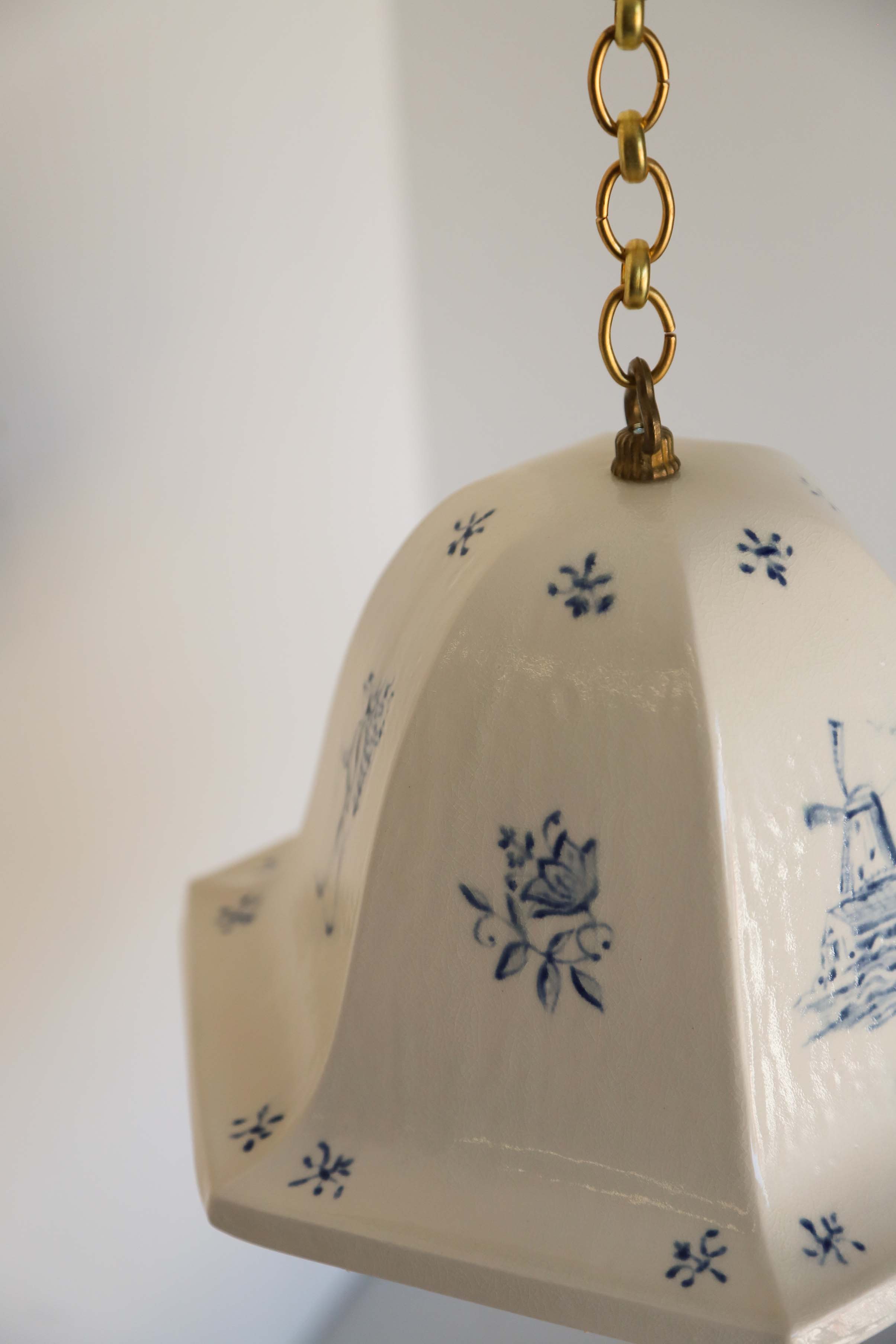 Artist's Edition - Maeve Pendant — angled view of ceramic shade with blue designs