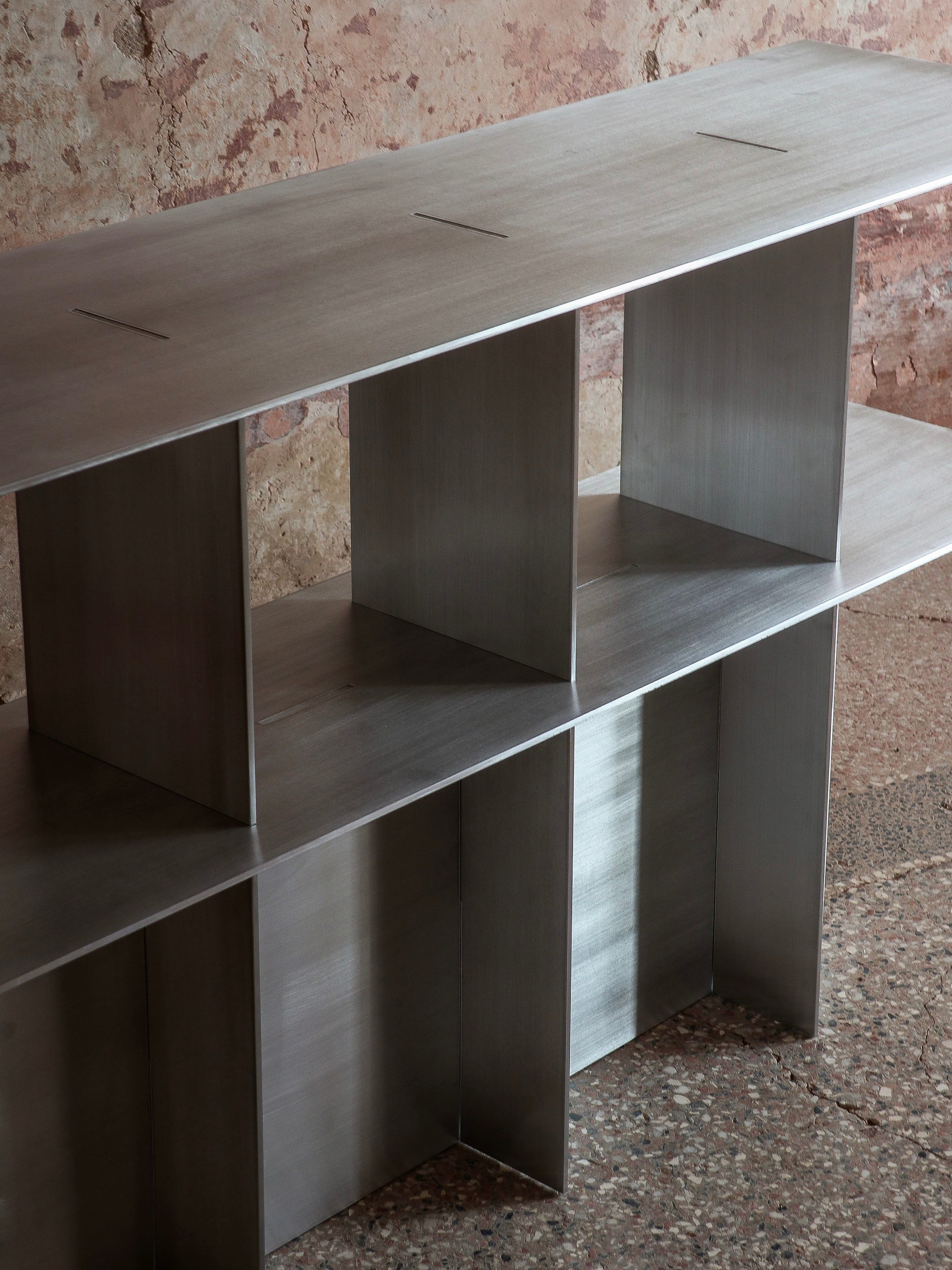 Lamina aluminum console — in context