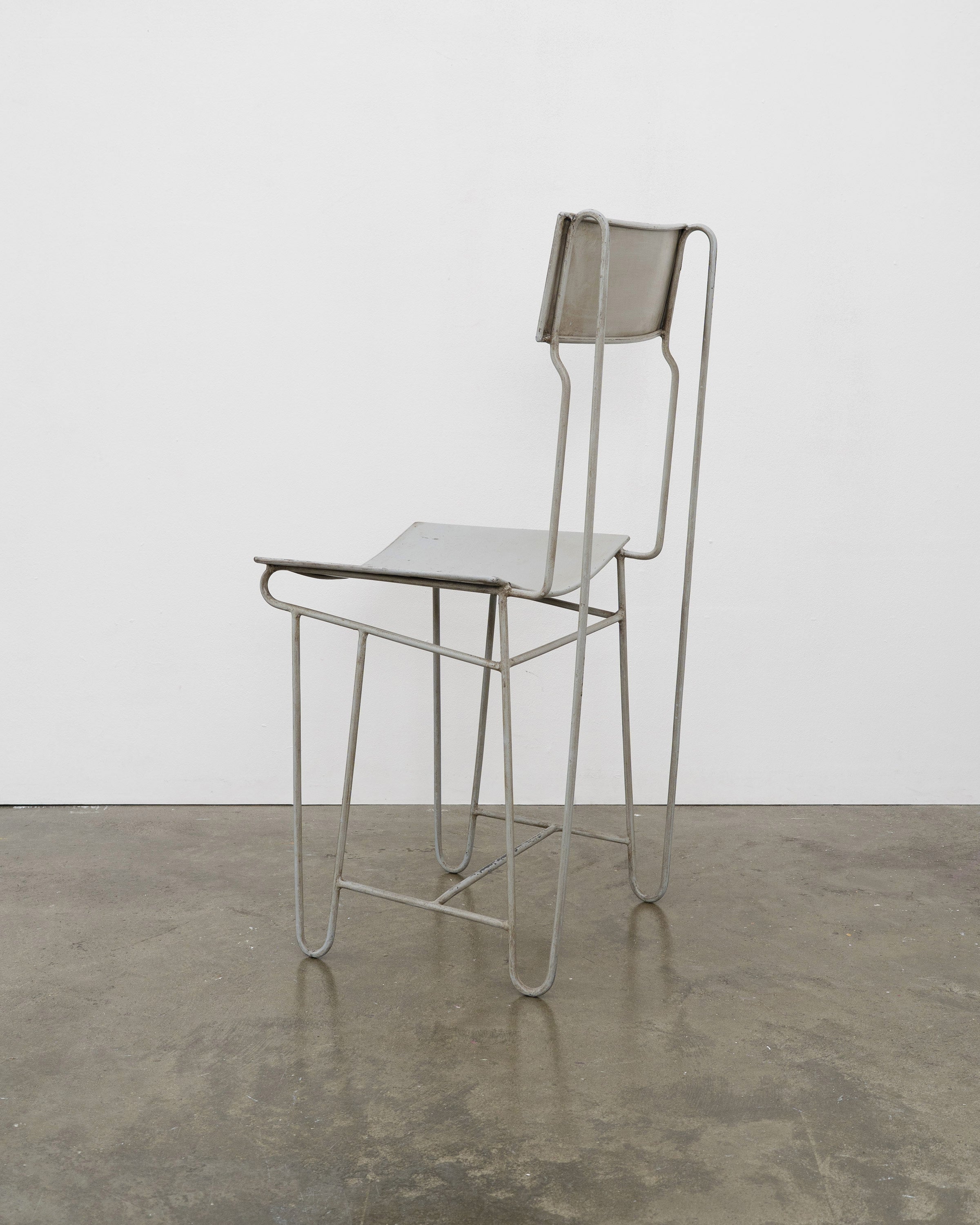 Modernist Steel Chair — side angle showing gray metal frame