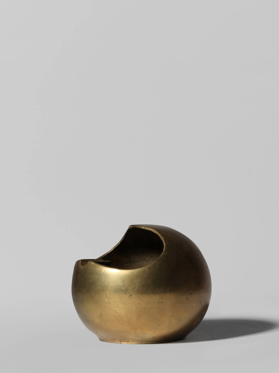 Modernist Spherical Brass Ashtray — side angle
